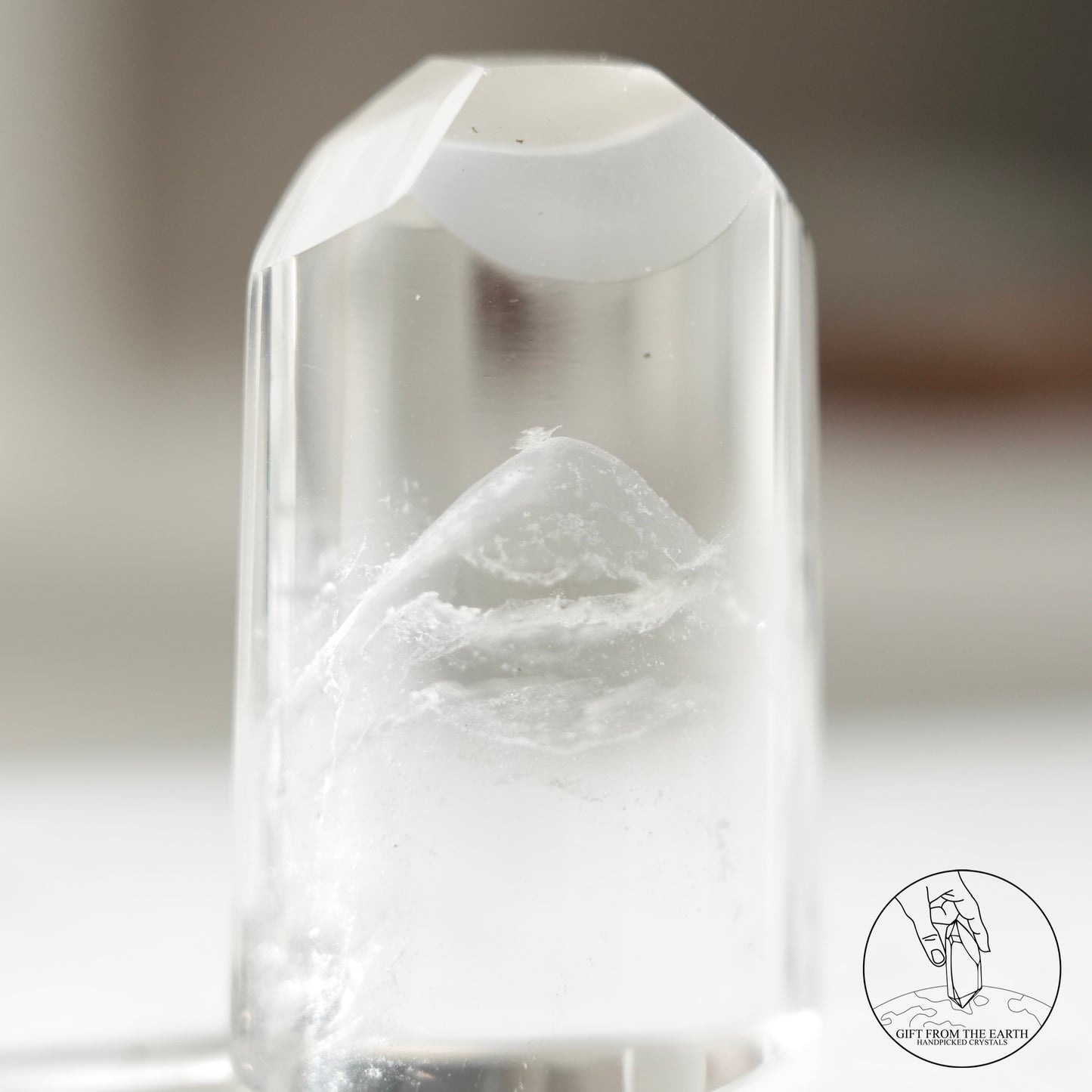 Half-polished multi-layered red-green phantom quartz point