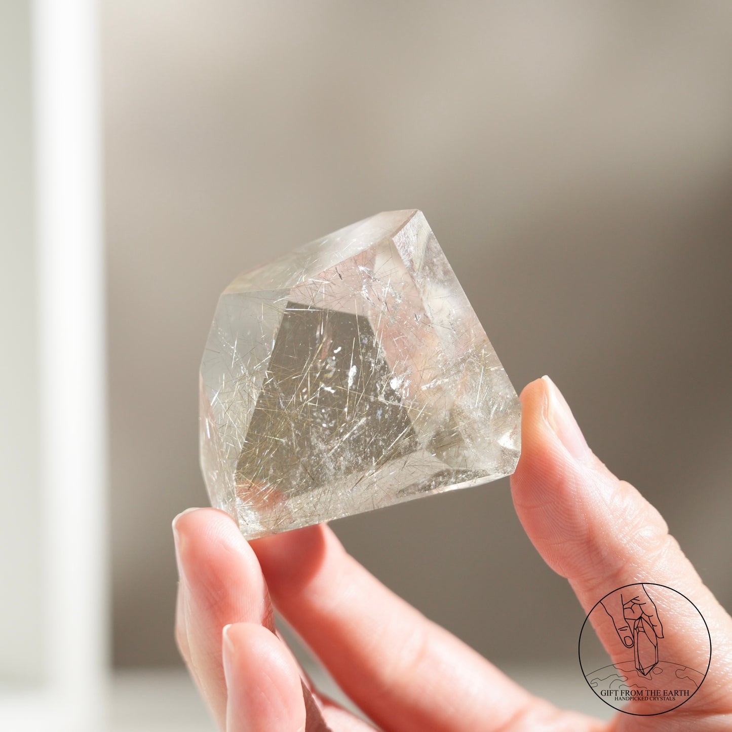 Green rutilated quartz sphere