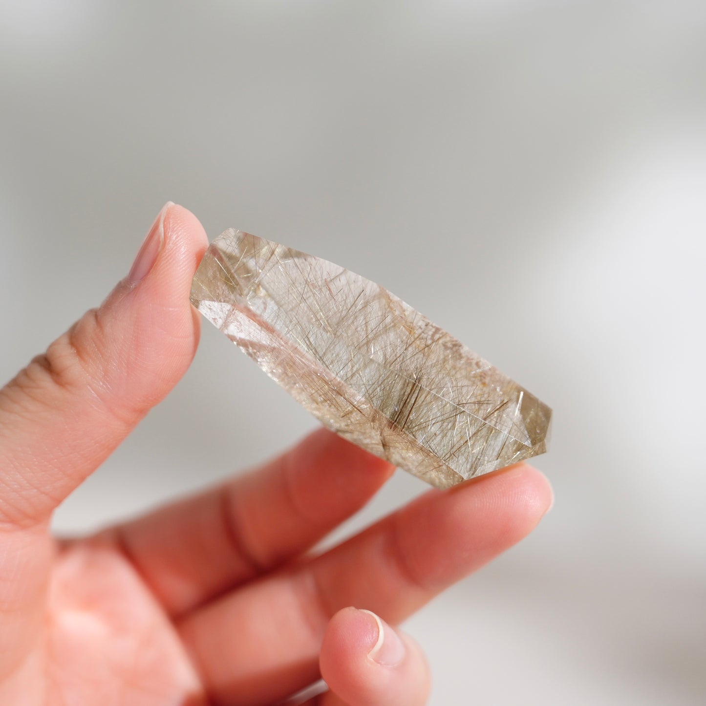 Green rutilated quartz sphere