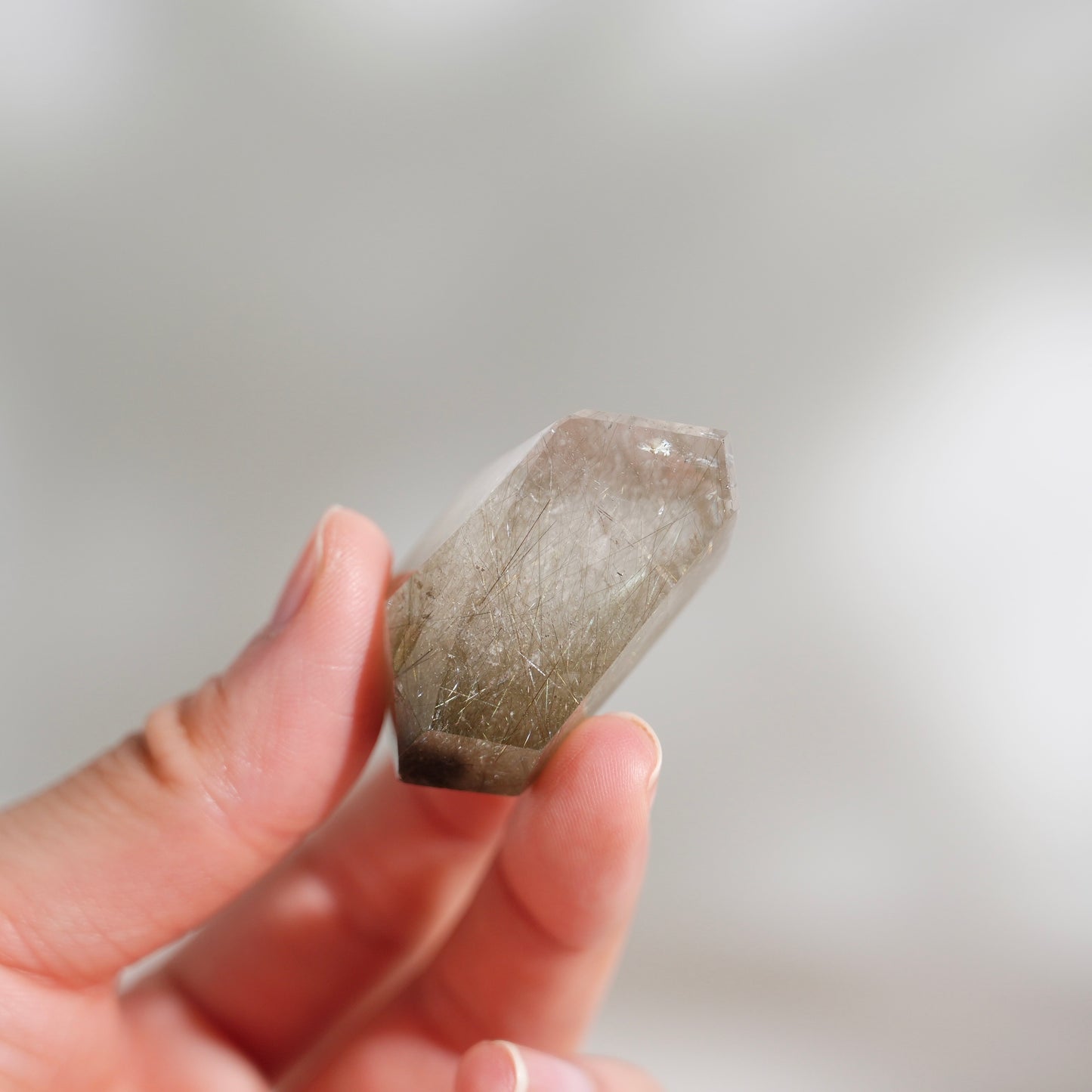 Green rutilated quartz sphere