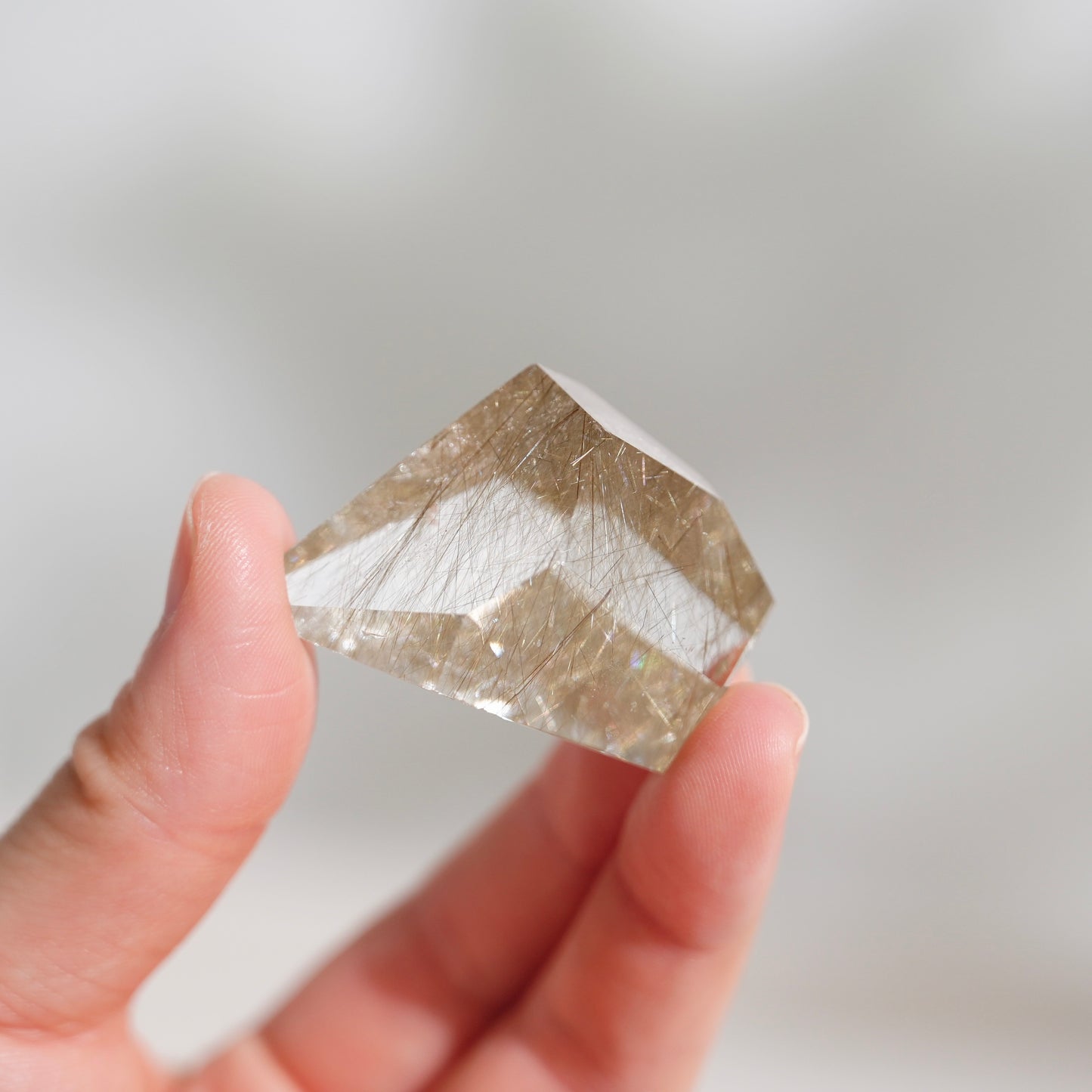 Green rutilated quartz sphere