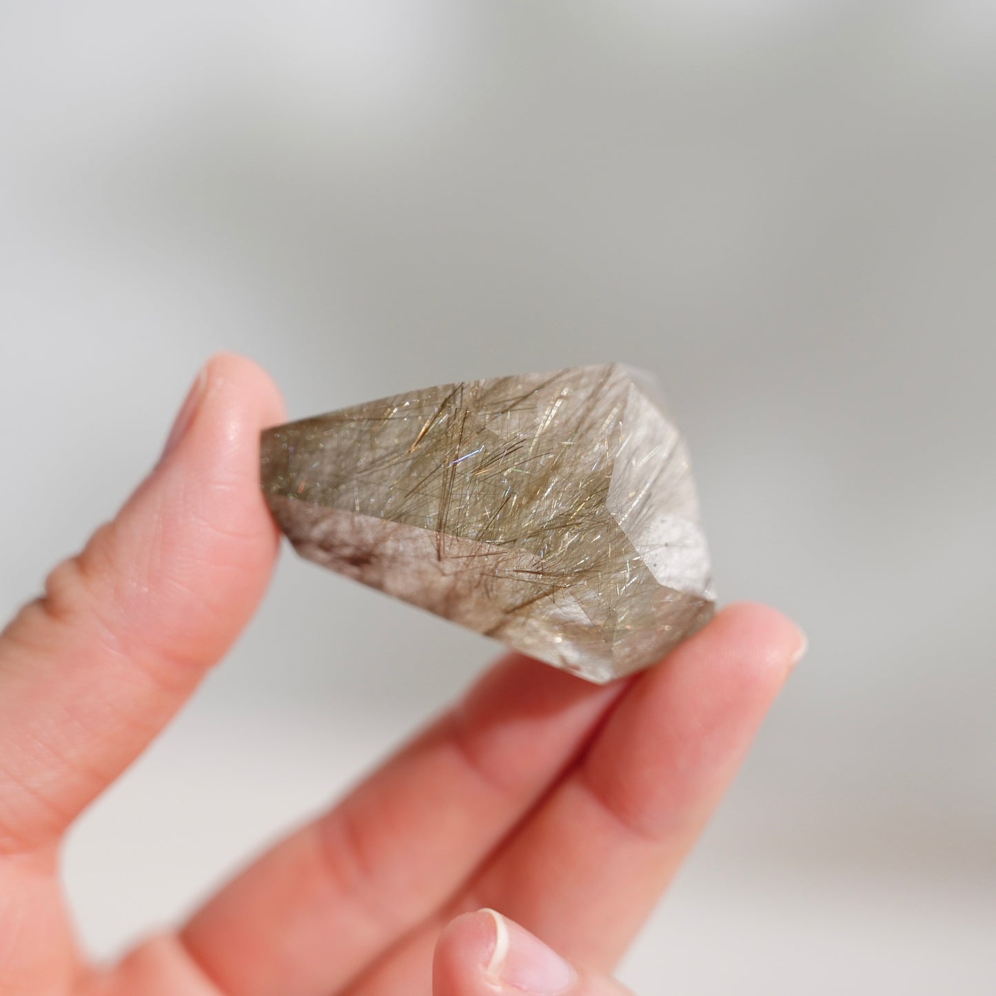 Green rutilated quartz sphere