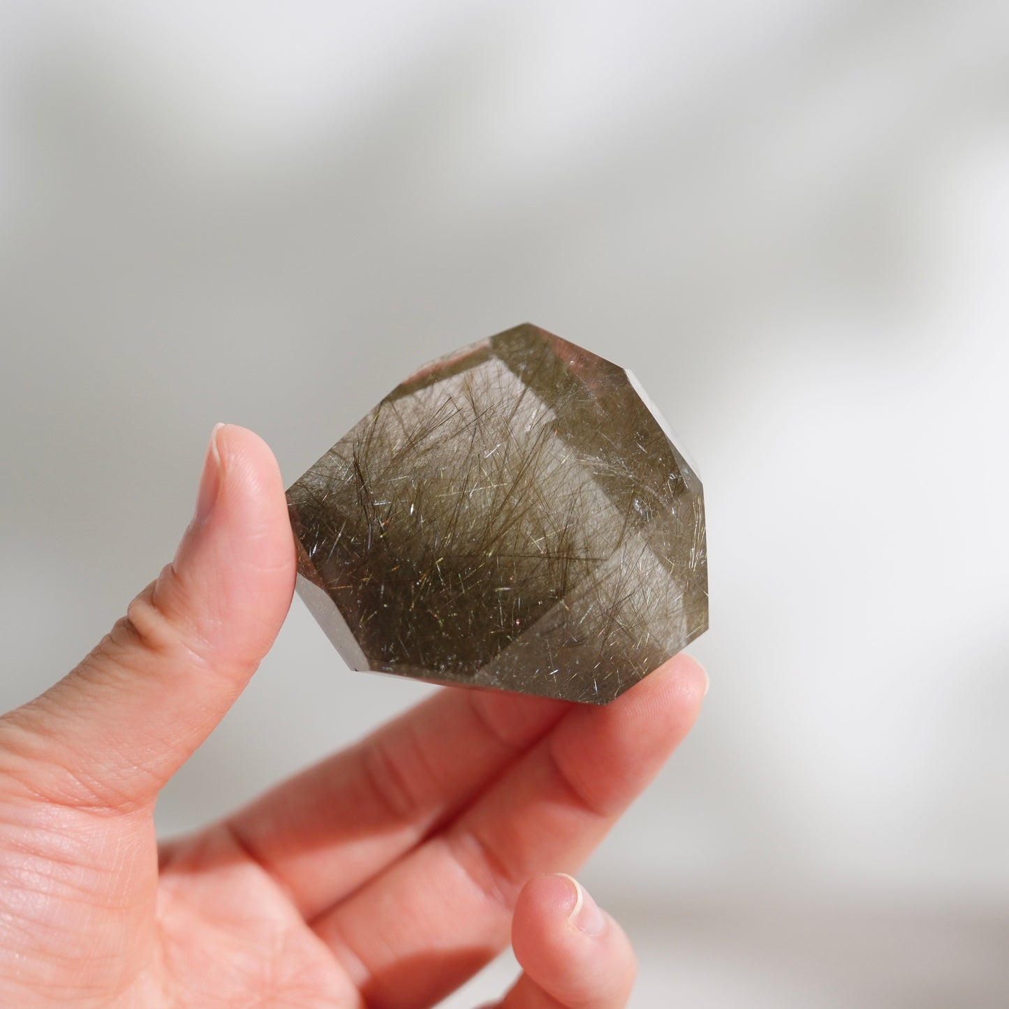 Green rutilated quartz sphere