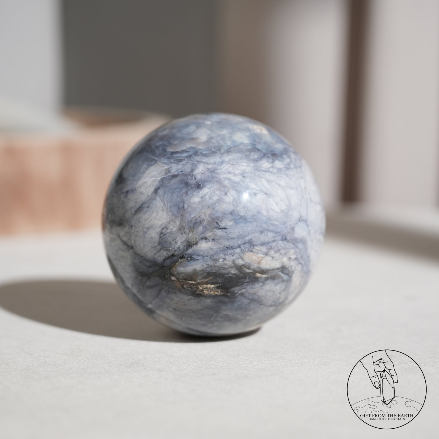 Blue petrified wood sphere