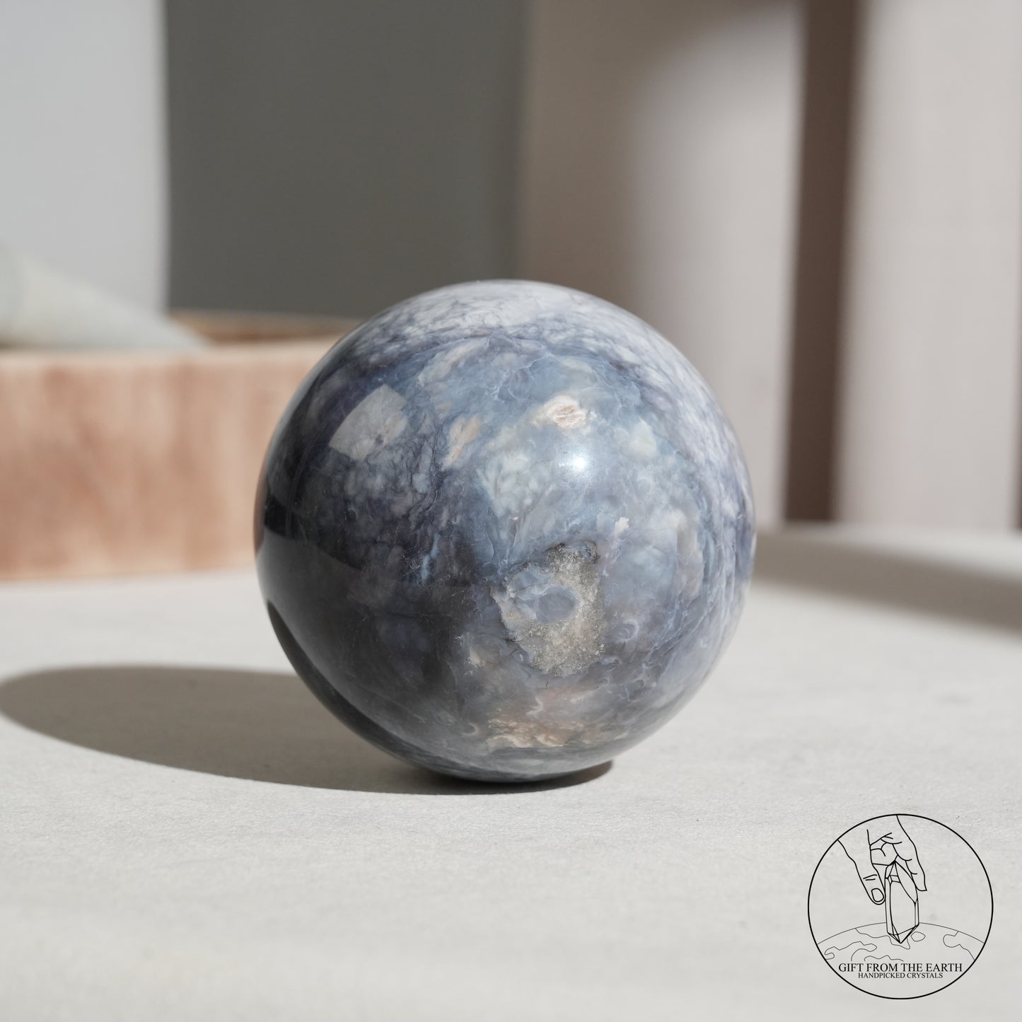 Blue petrified wood sphere