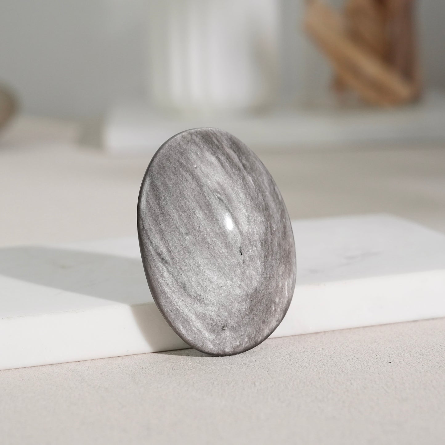 Silver sheen obsidian palm stone