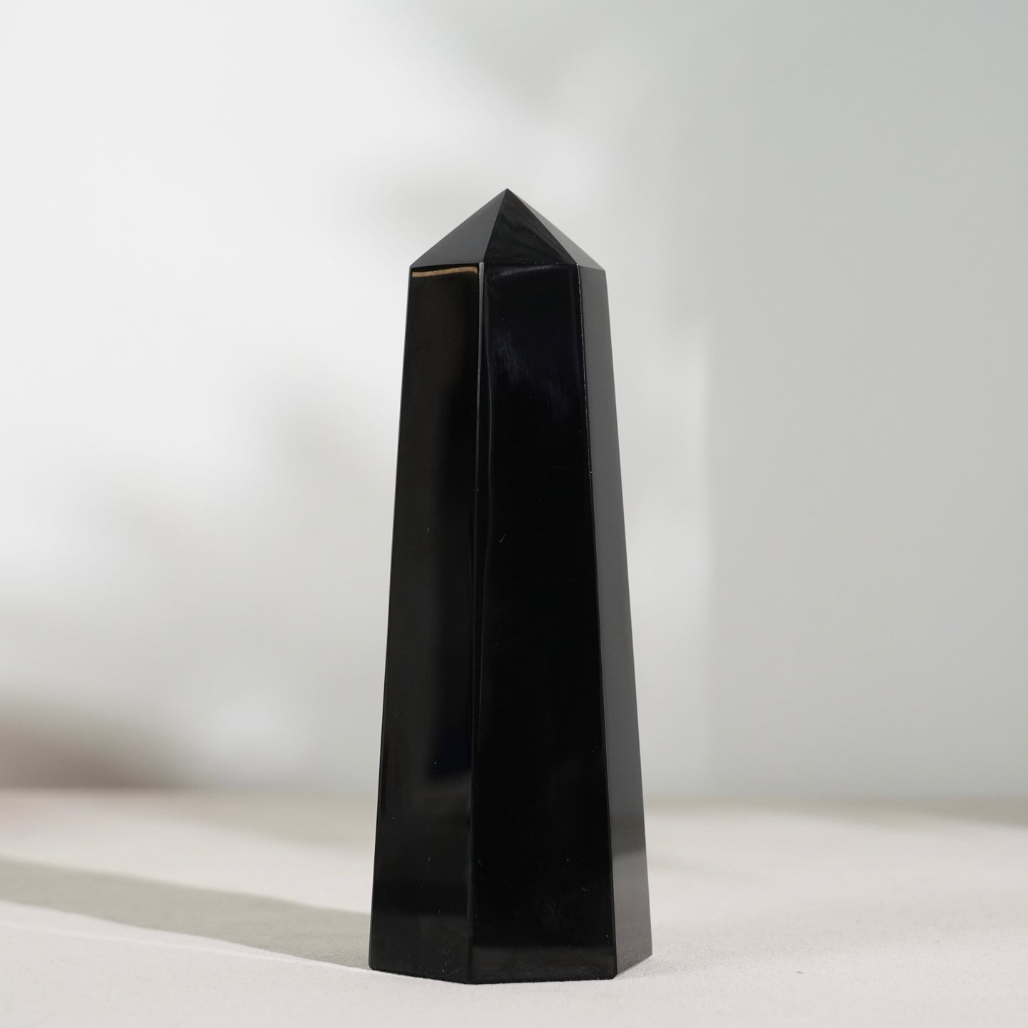 Golden obsidian sphere