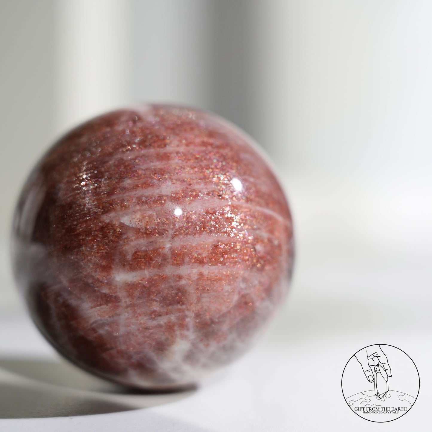 Golden sunstone sphere