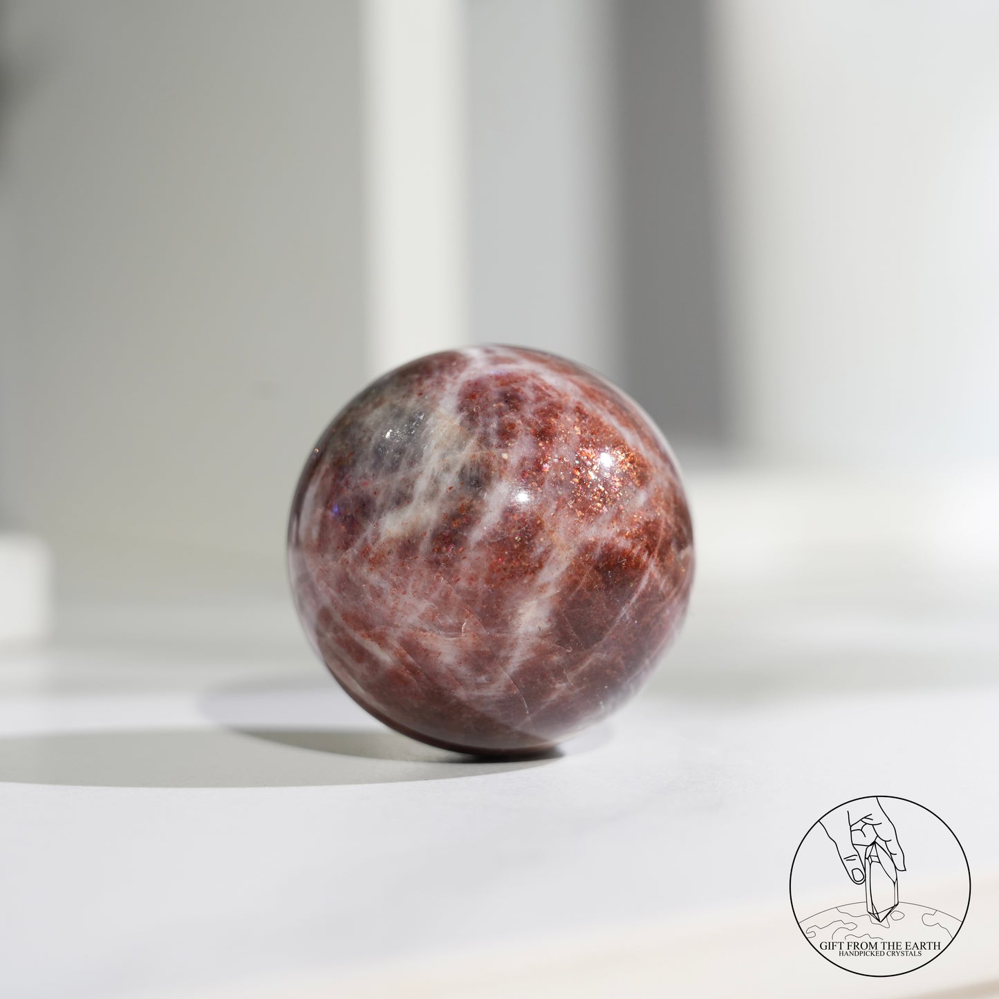 Golden sunstone sphere