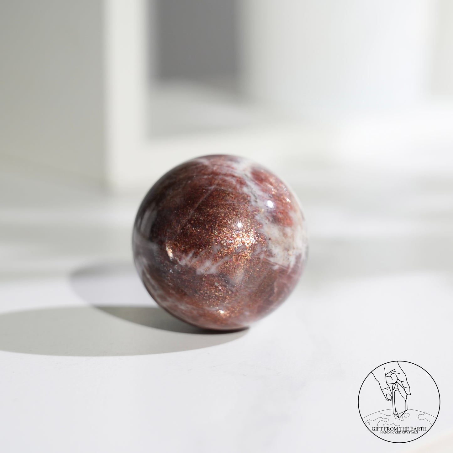 Golden sunstone sphere