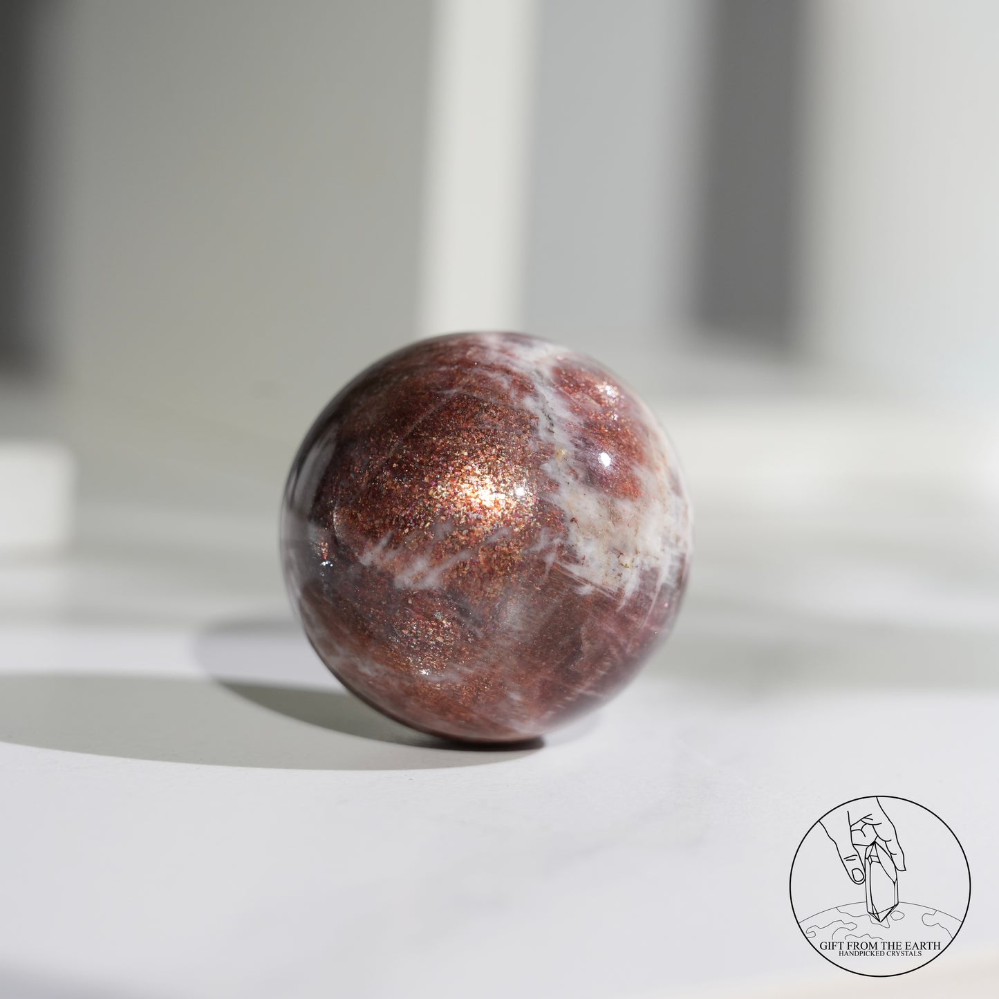 Golden sunstone sphere