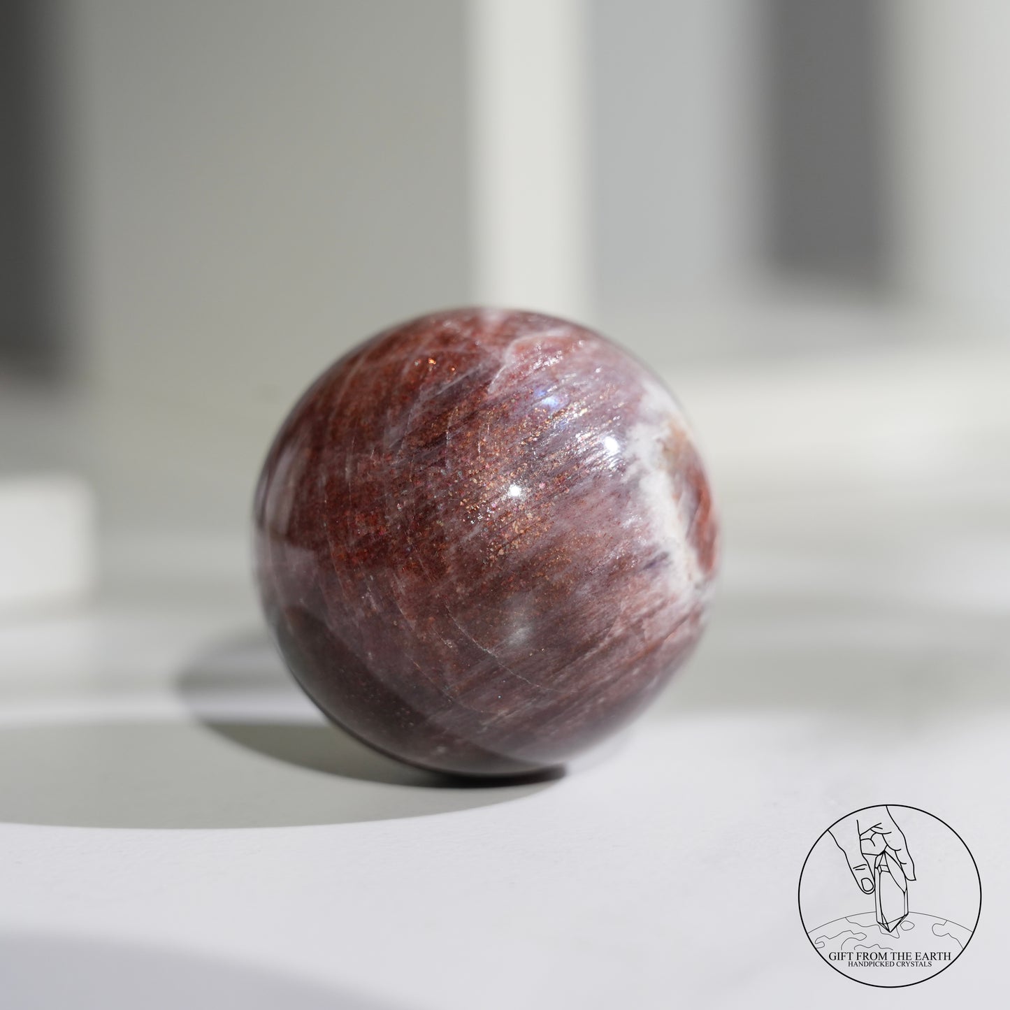 Golden sunstone sphere