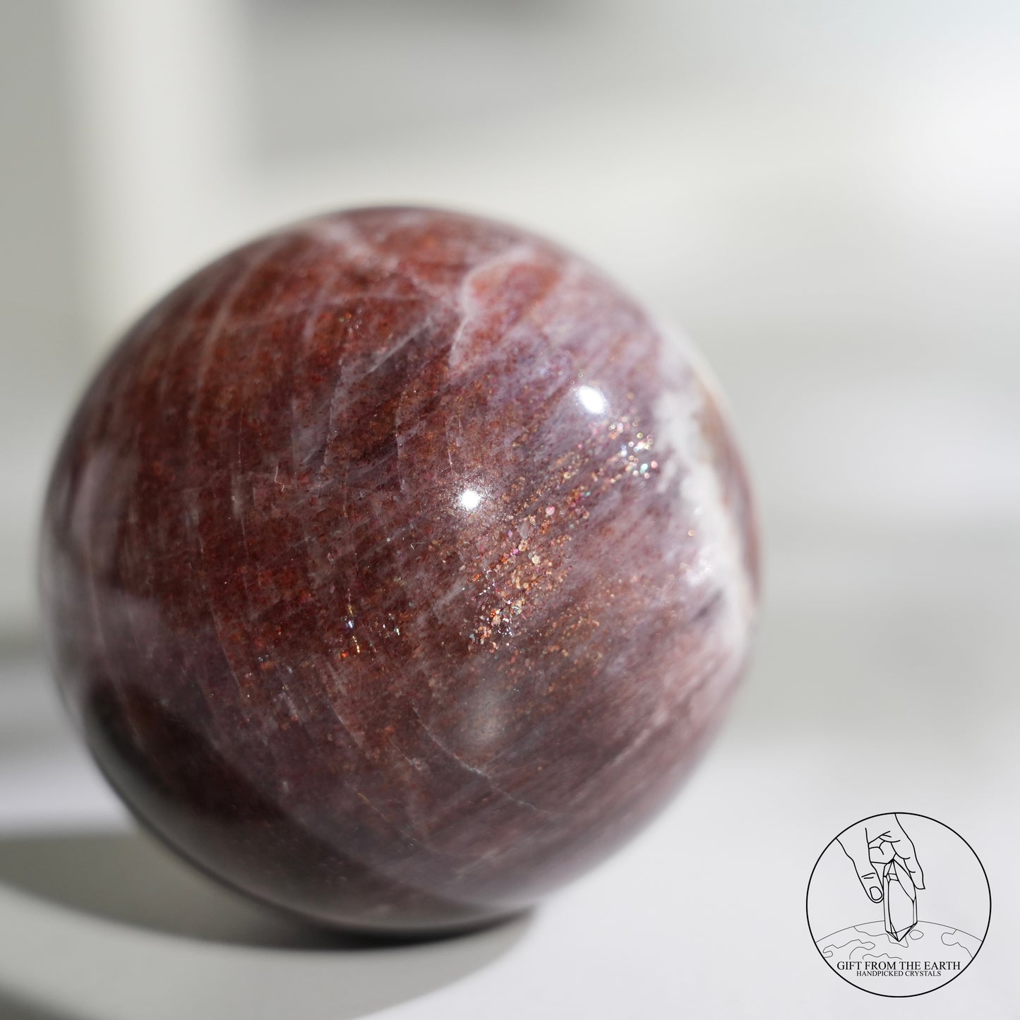 Golden sunstone sphere