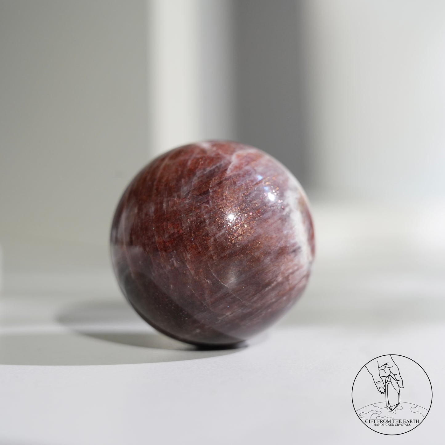 Golden sunstone sphere