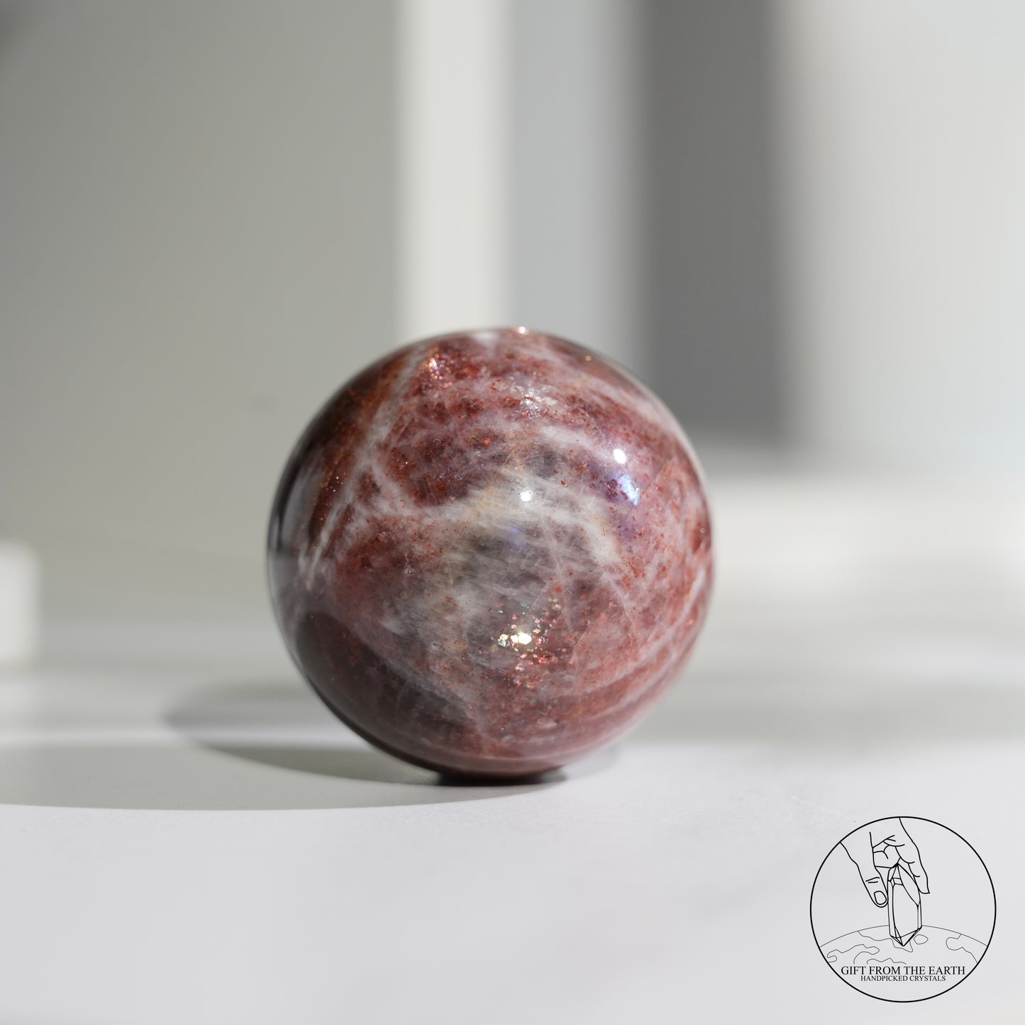Golden sunstone sphere