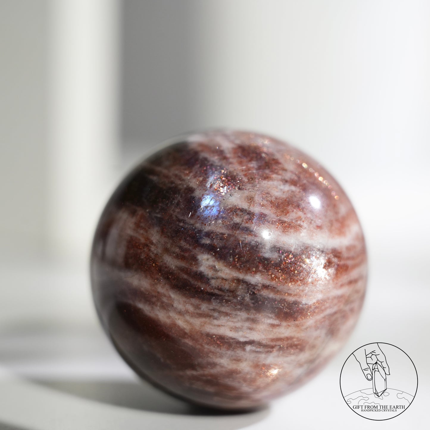 Golden sunstone sphere