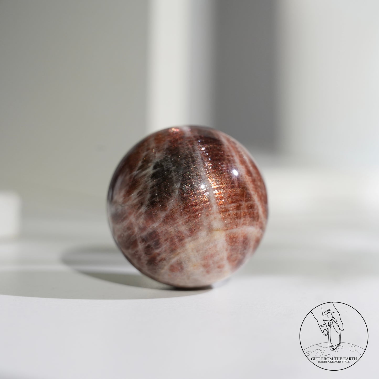 Golden sunstone sphere