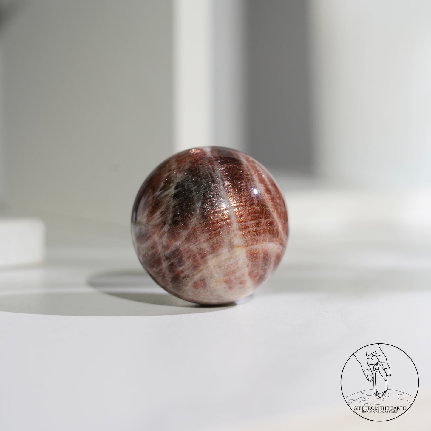 Golden sunstone sphere