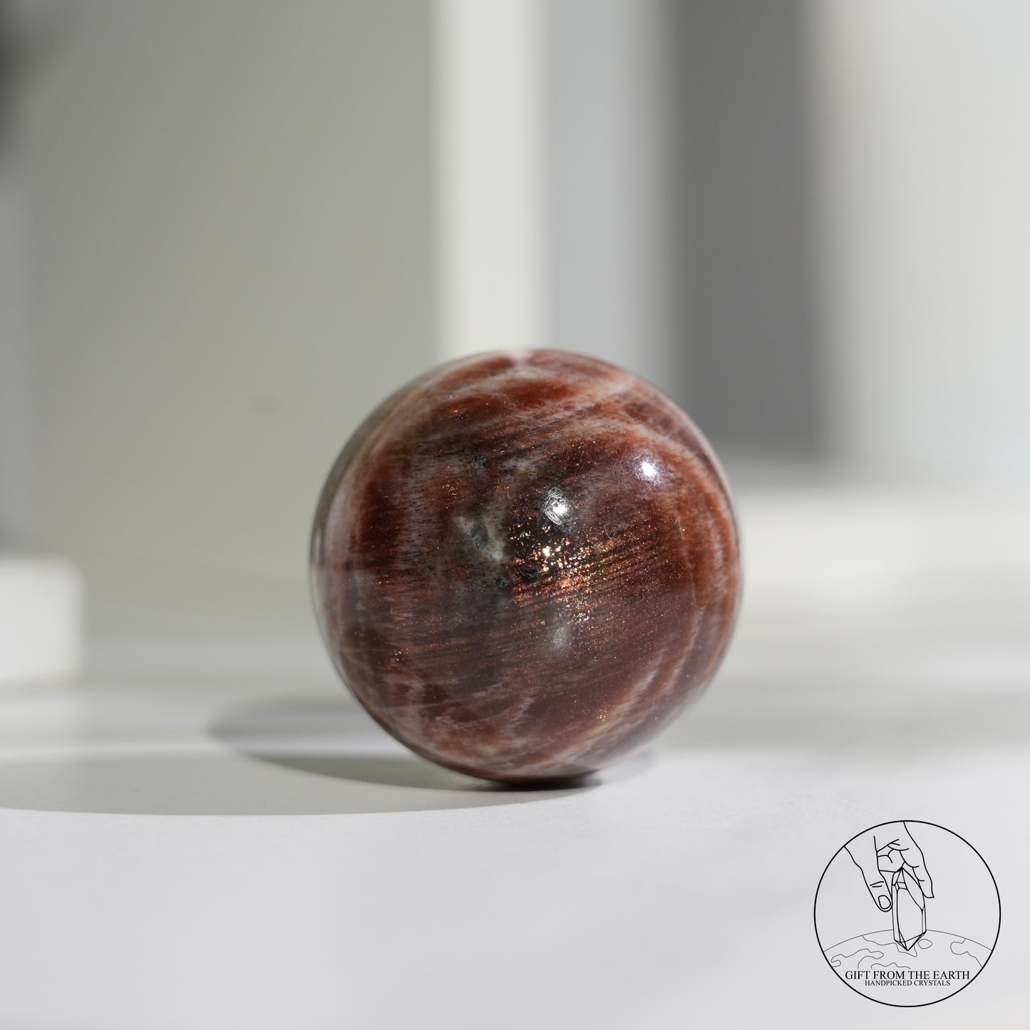Golden sunstone sphere