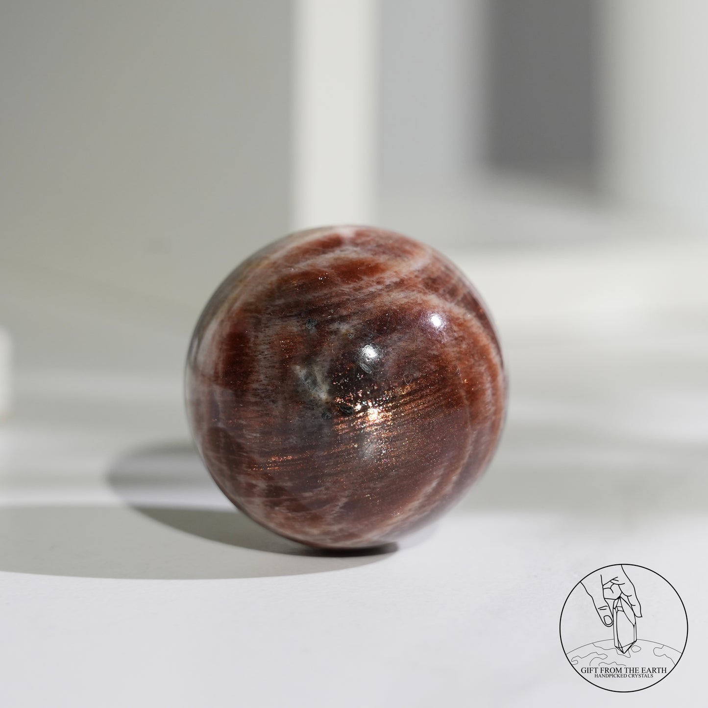 Golden sunstone sphere
