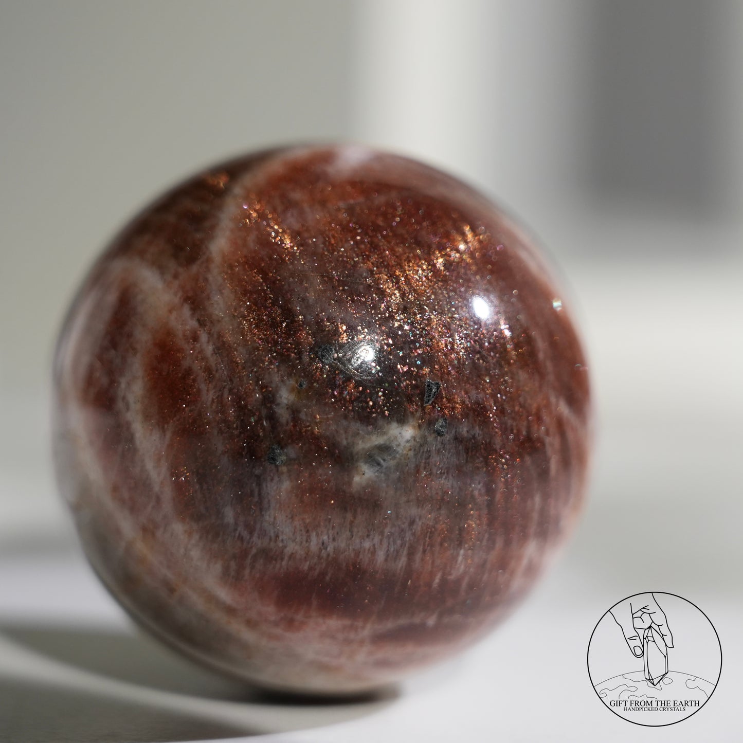 Golden sunstone sphere