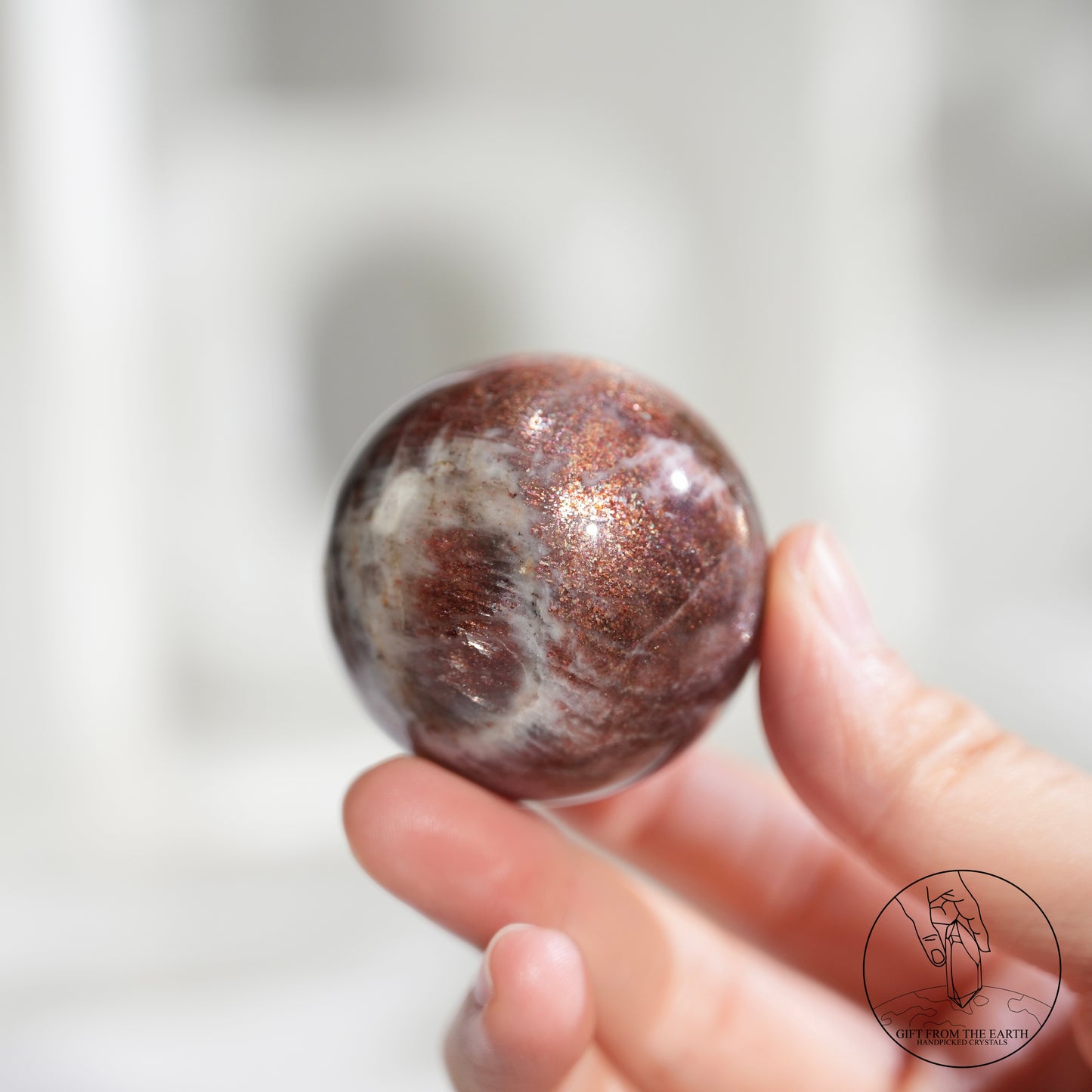 Golden sunstone sphere