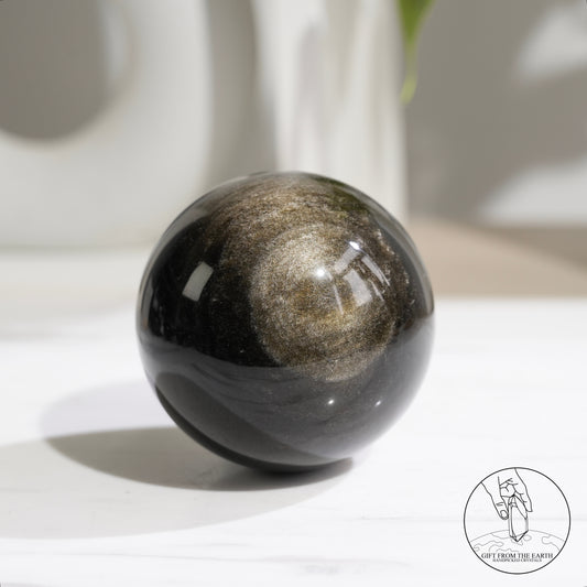 Golden obsidian sphere
