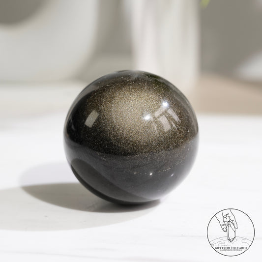 Golden obsidian sphere