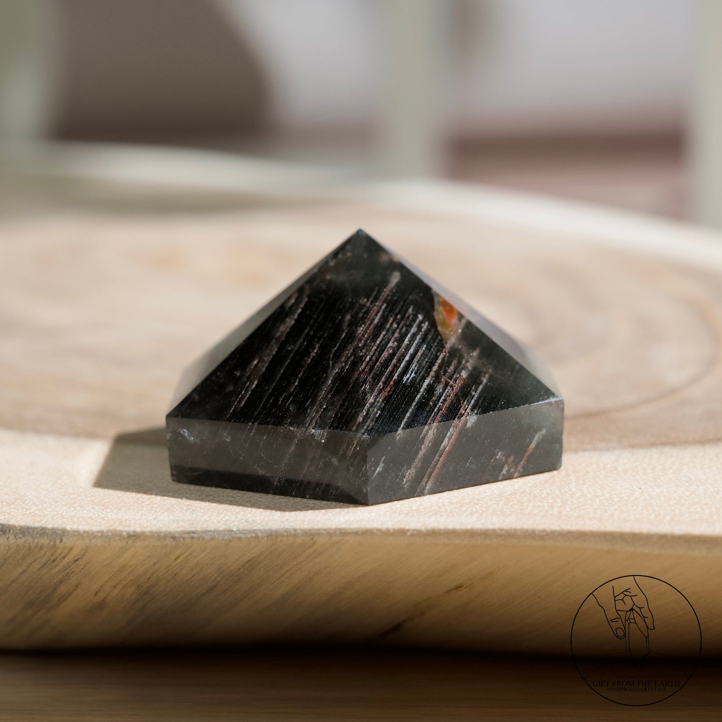 Half-polished multi-layered red-green phantom quartz point