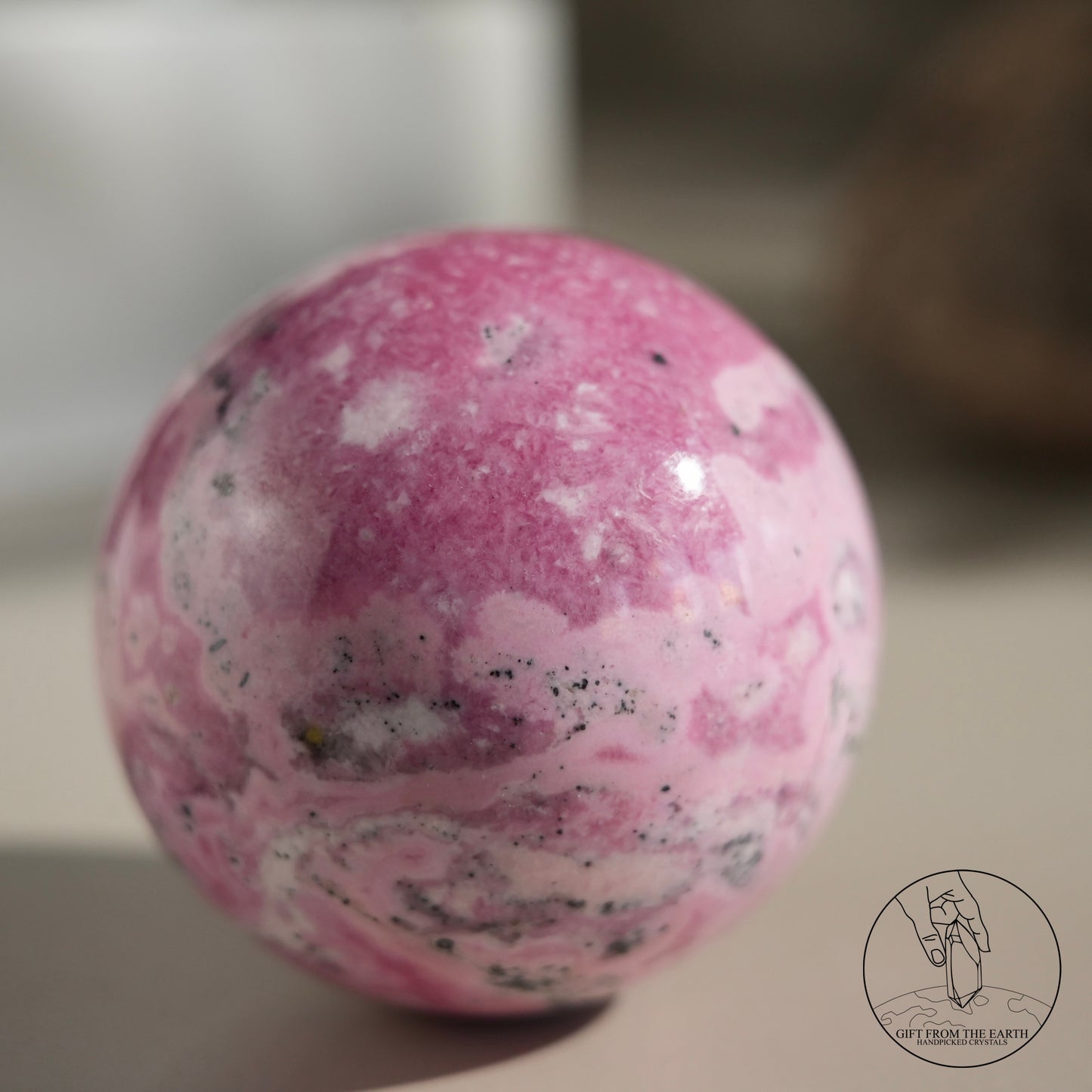 Peruvian rhodochrosite sphere