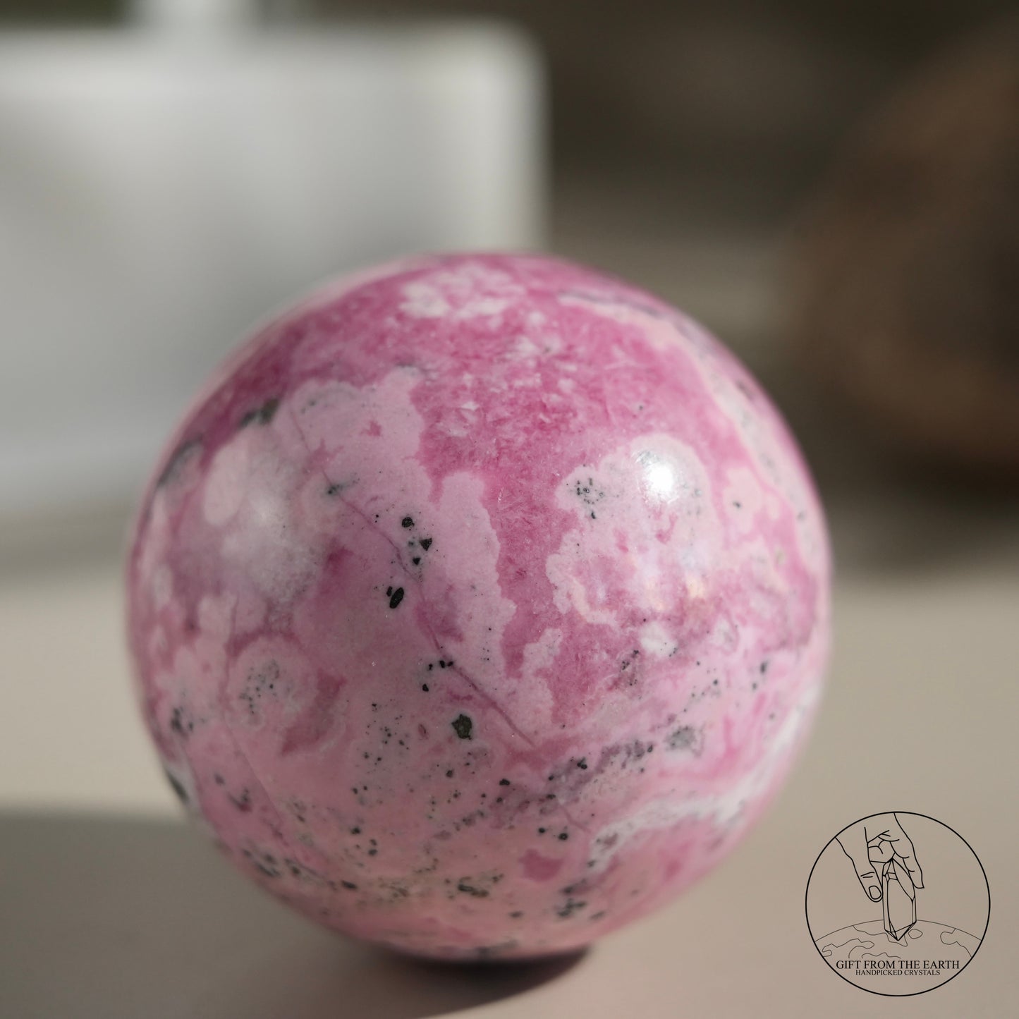 Peruvian rhodochrosite sphere