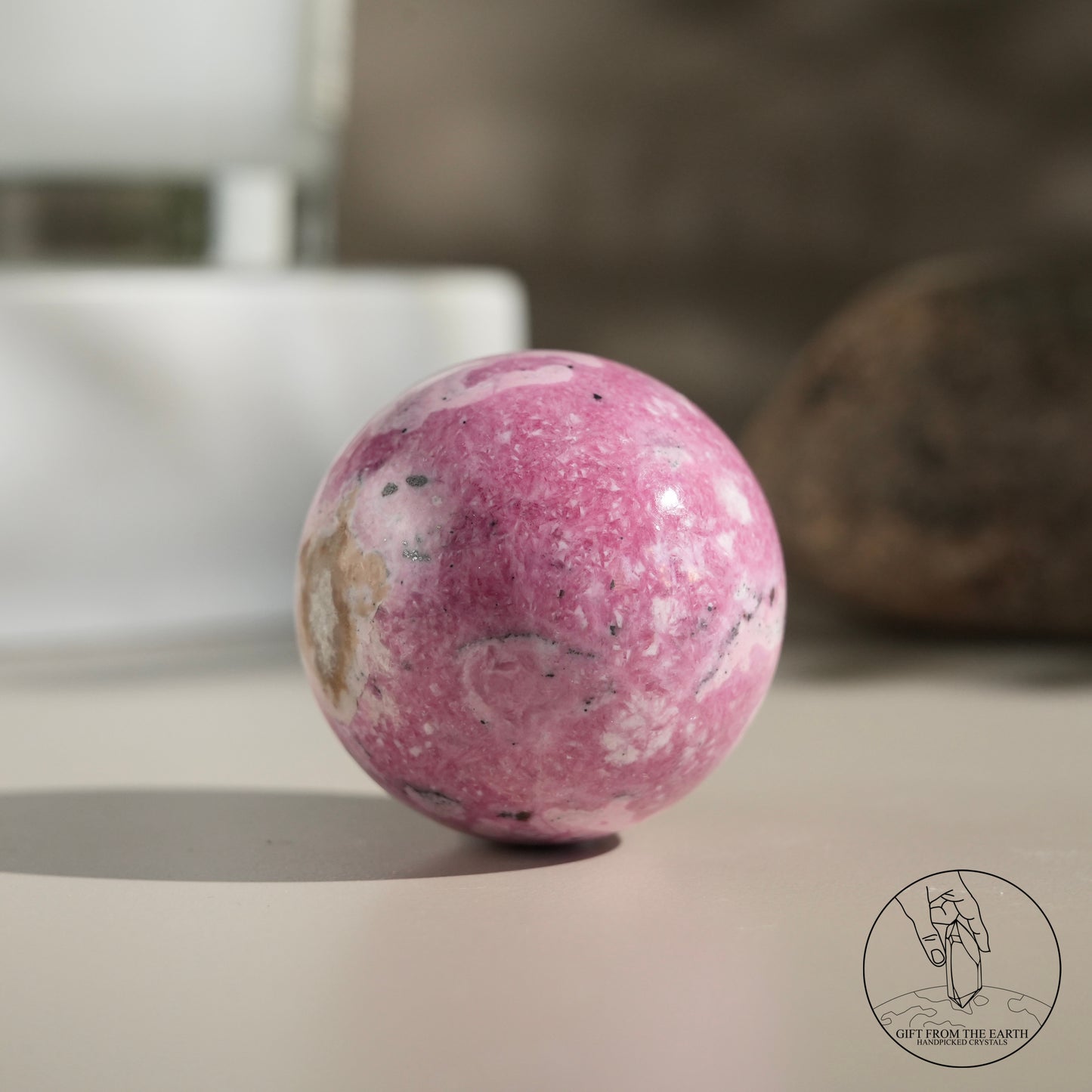 Peruvian rhodochrosite sphere