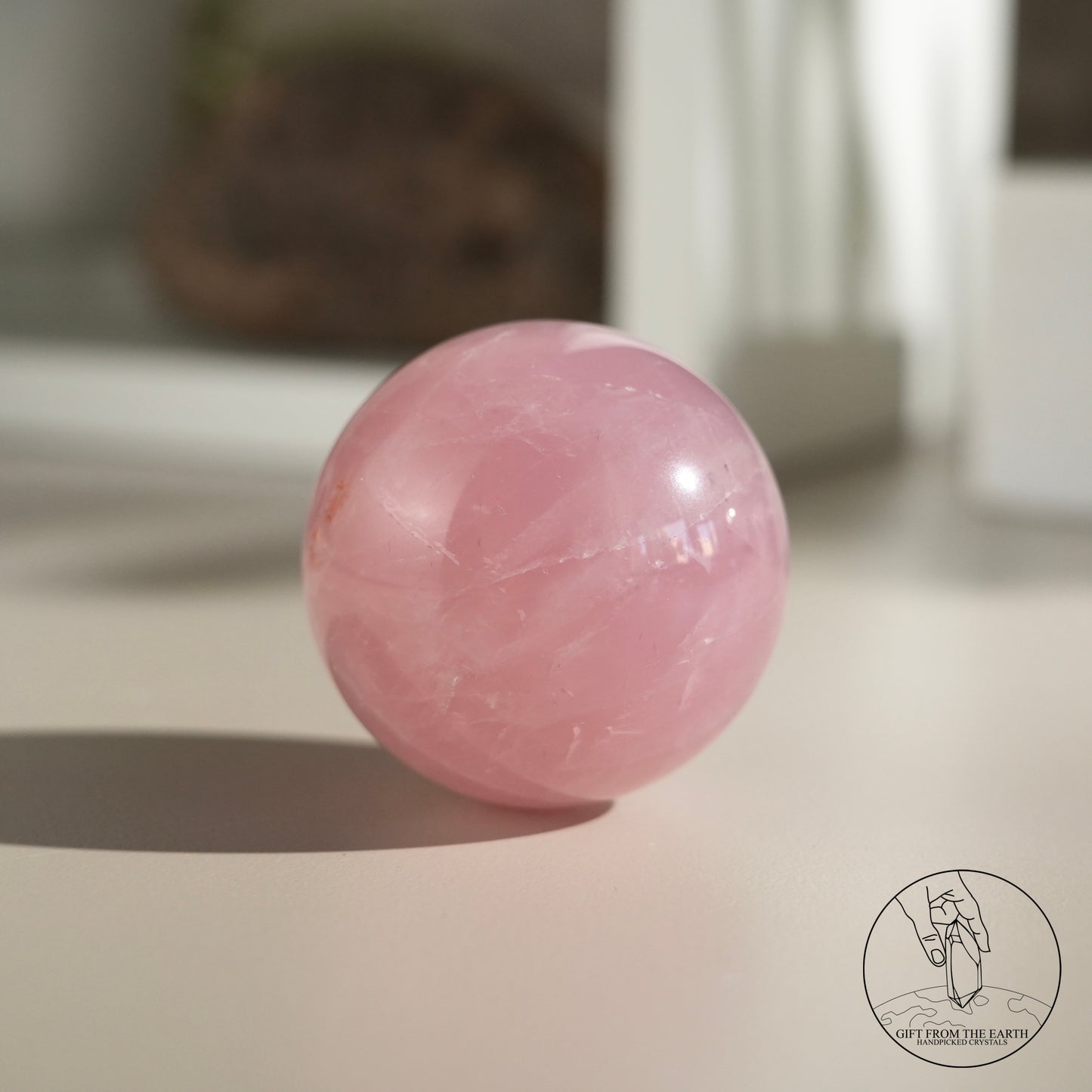 Mozambique starry rose quartz sphere