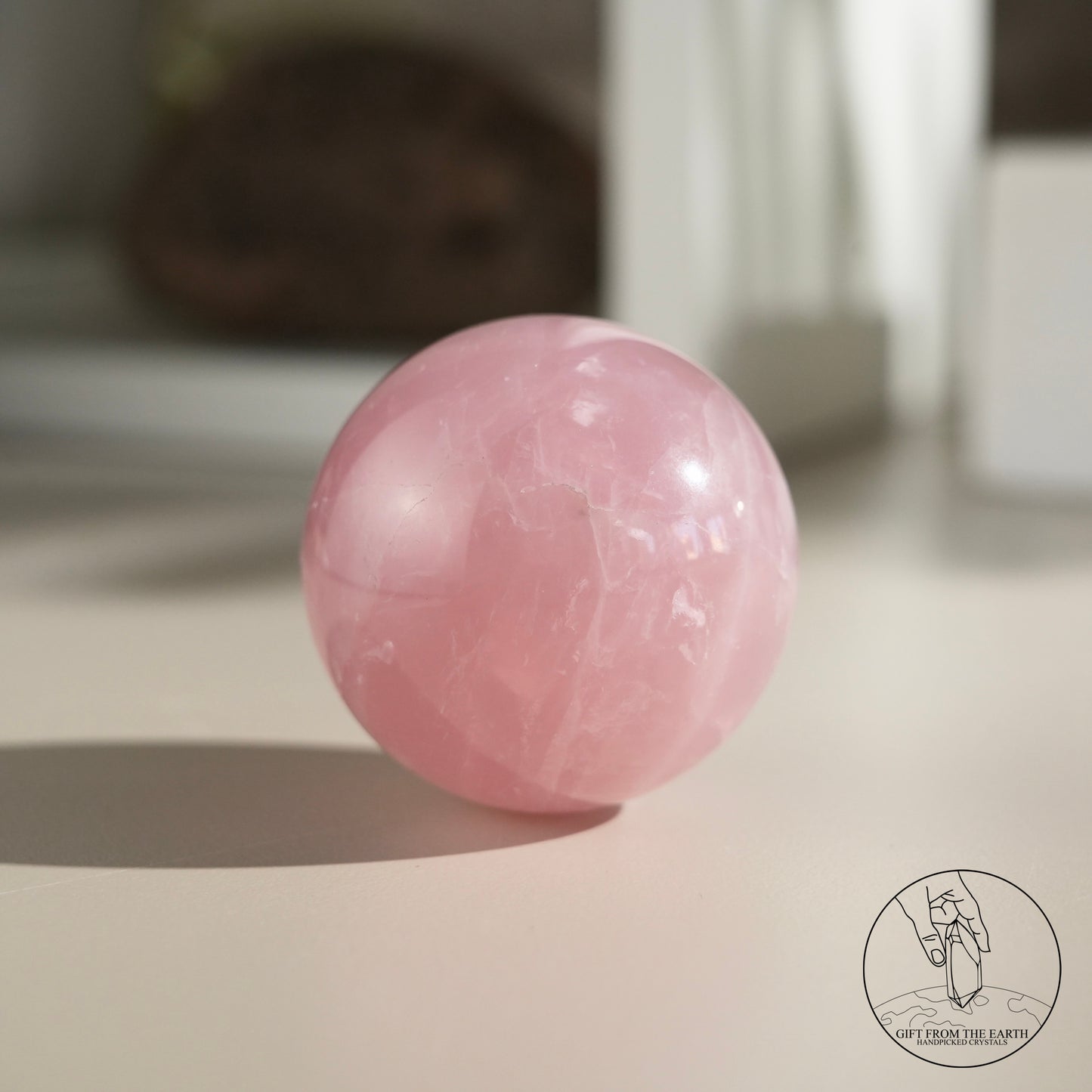 Mozambique starry rose quartz sphere