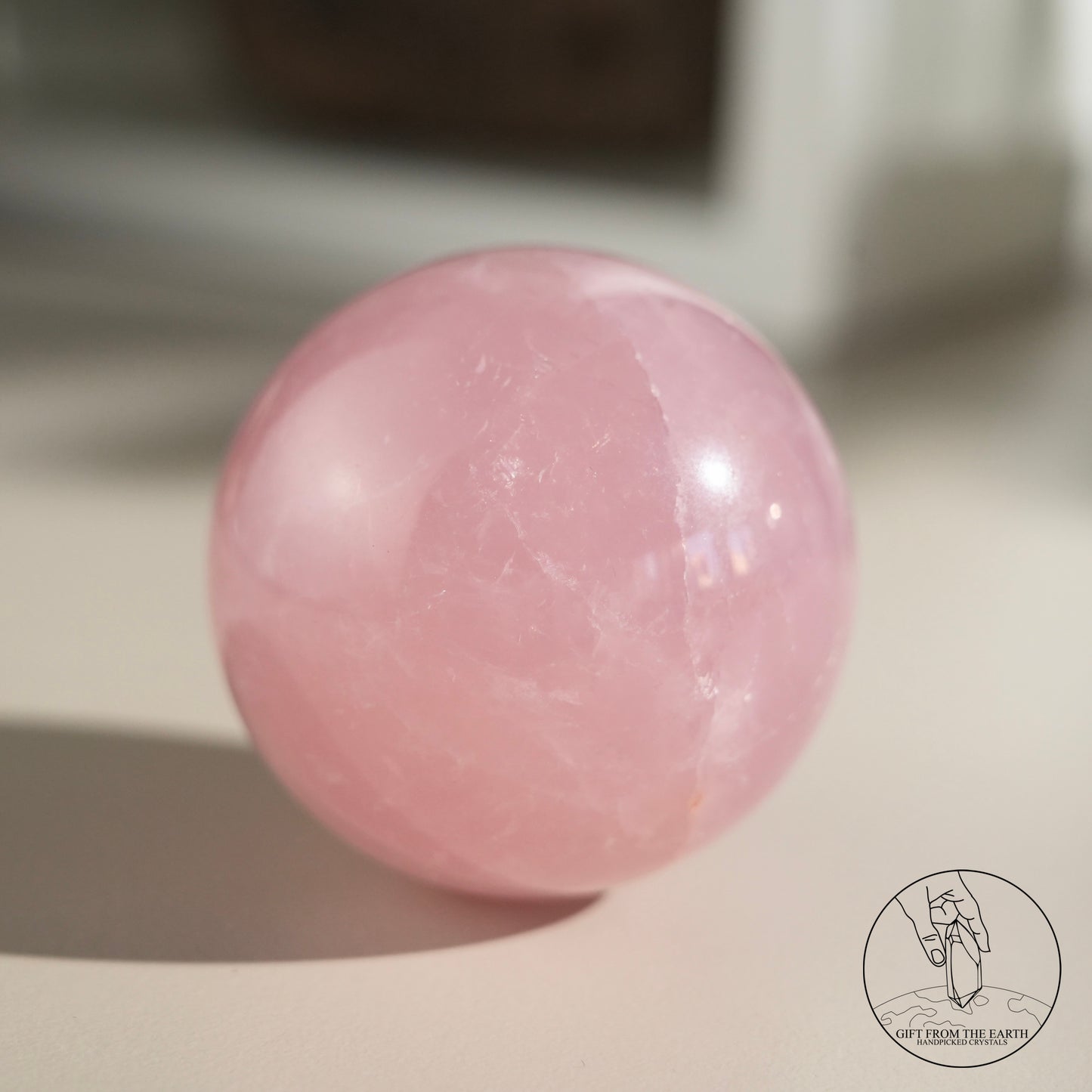 Mozambique starry rose quartz sphere