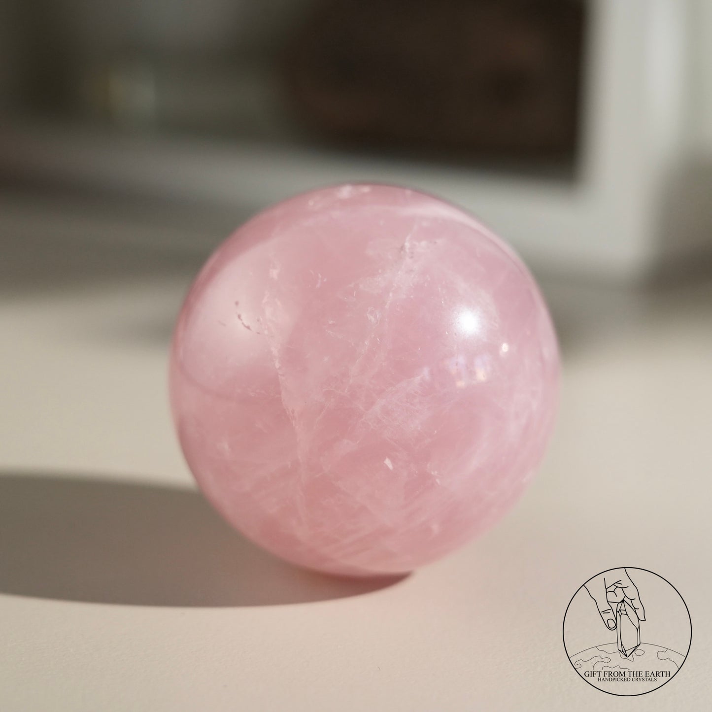 Mozambique starry rose quartz sphere