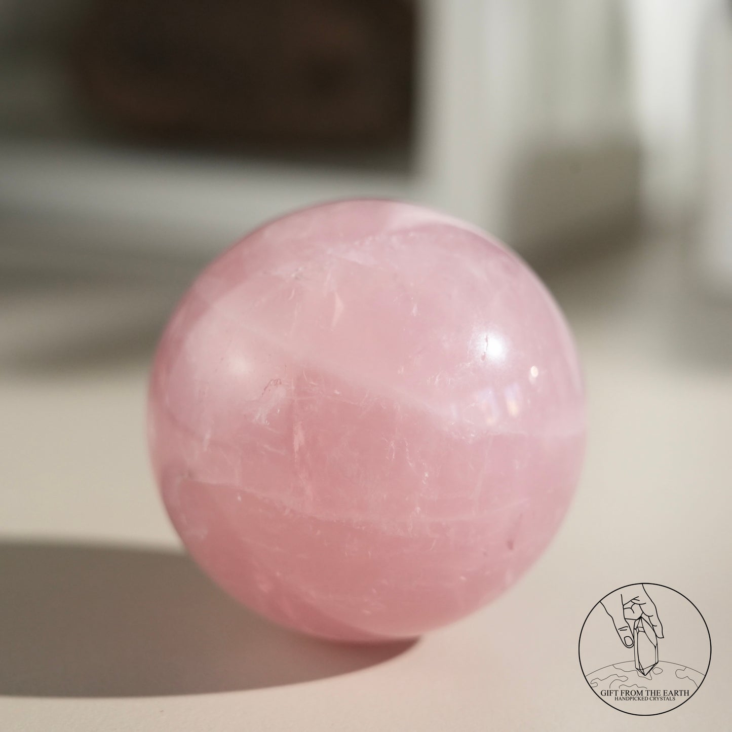 Mozambique starry rose quartz sphere