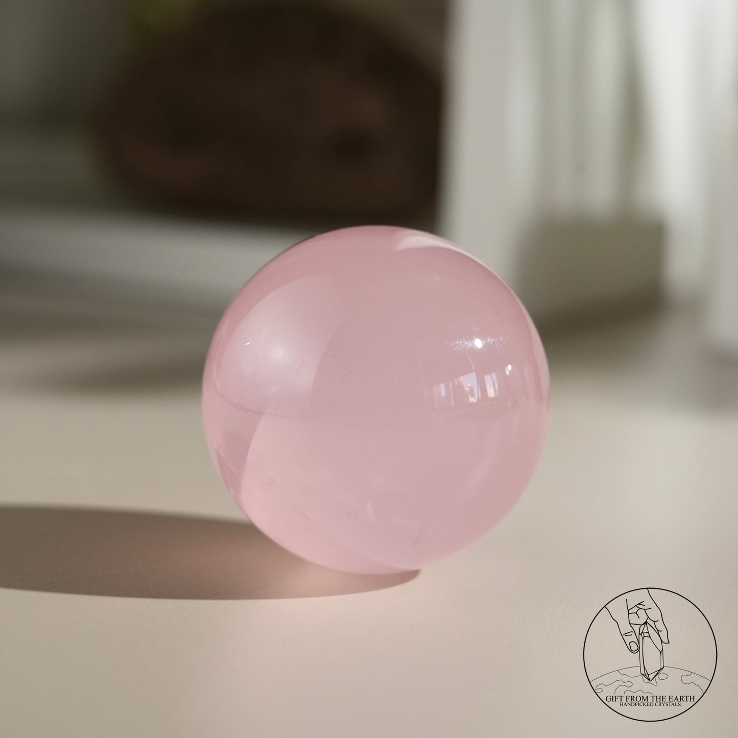 Mozambique starry rose quartz sphere