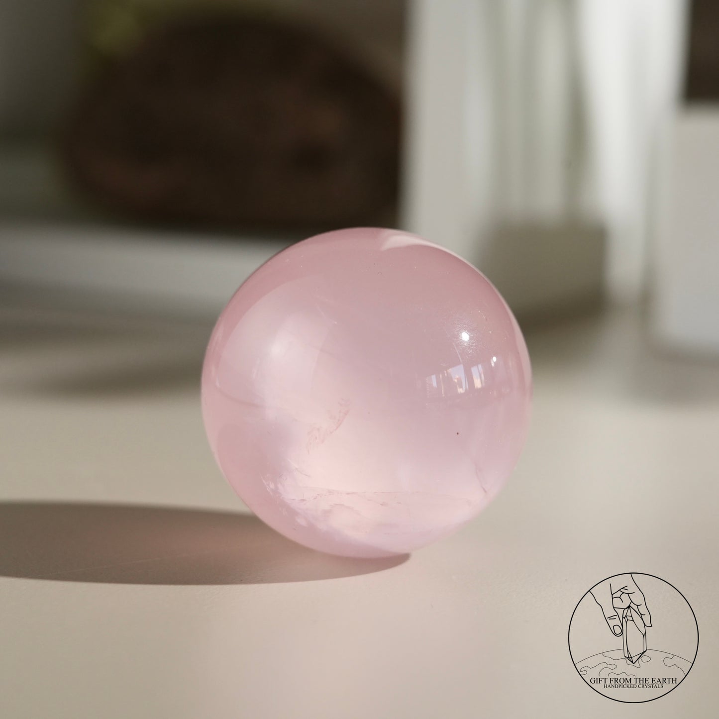 Mozambique starry rose quartz sphere