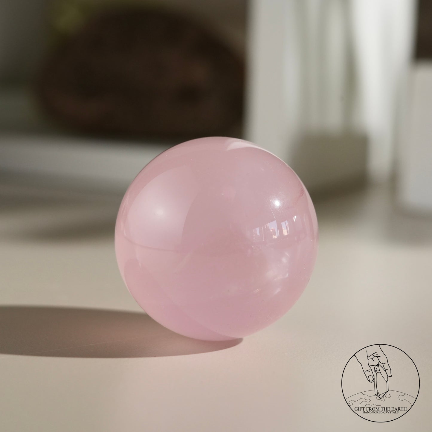 Mozambique starry rose quartz sphere