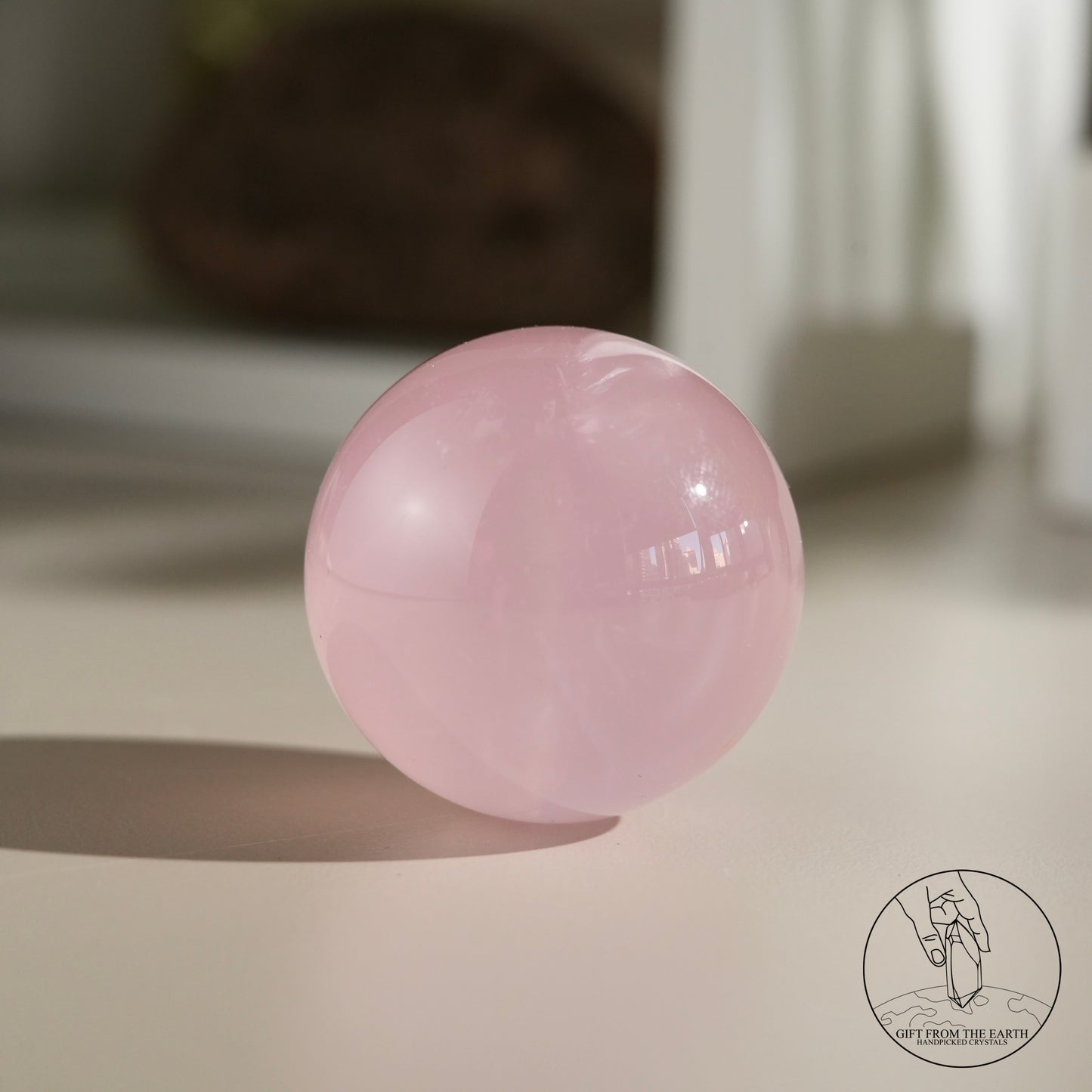 Mozambique starry rose quartz sphere