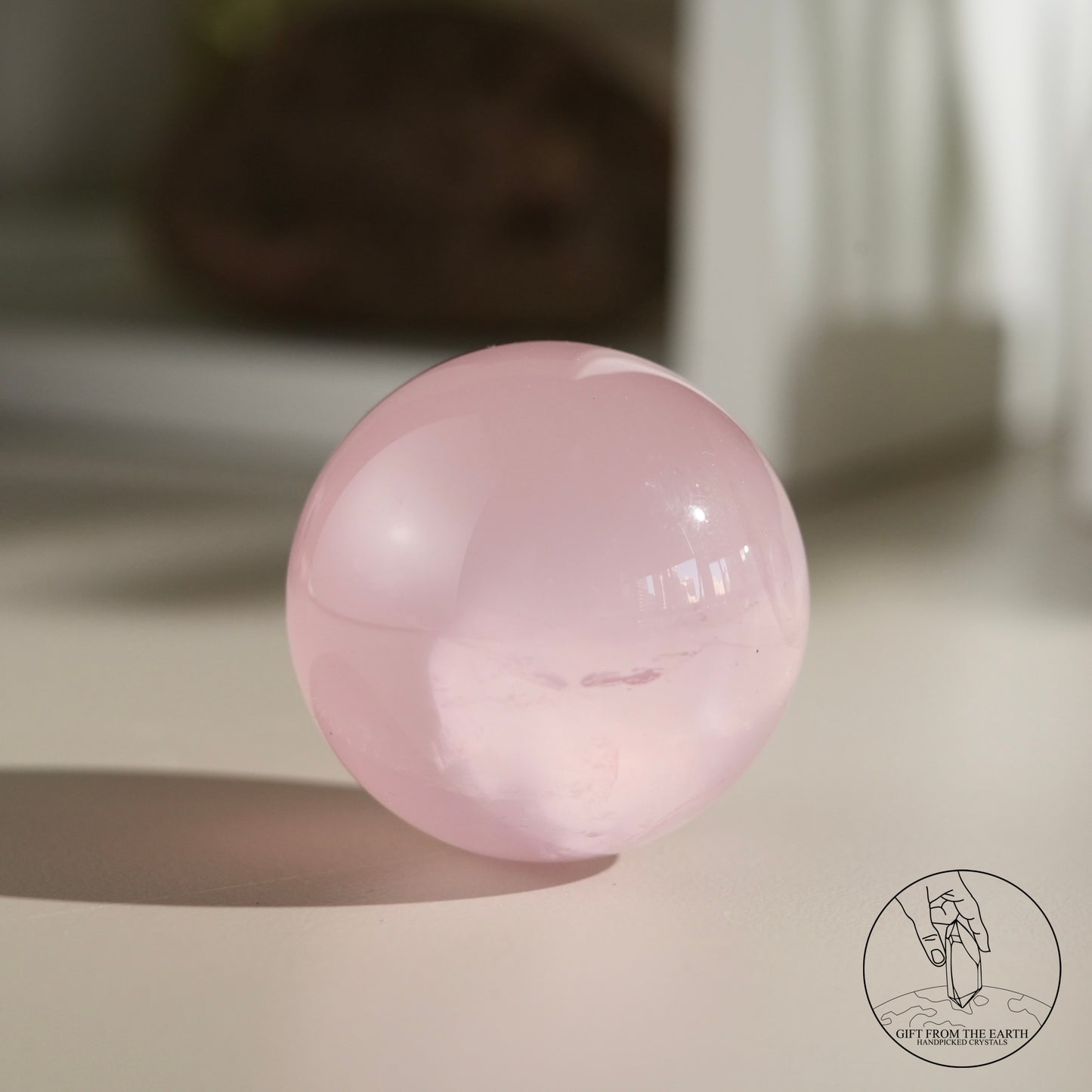 Mozambique starry rose quartz sphere