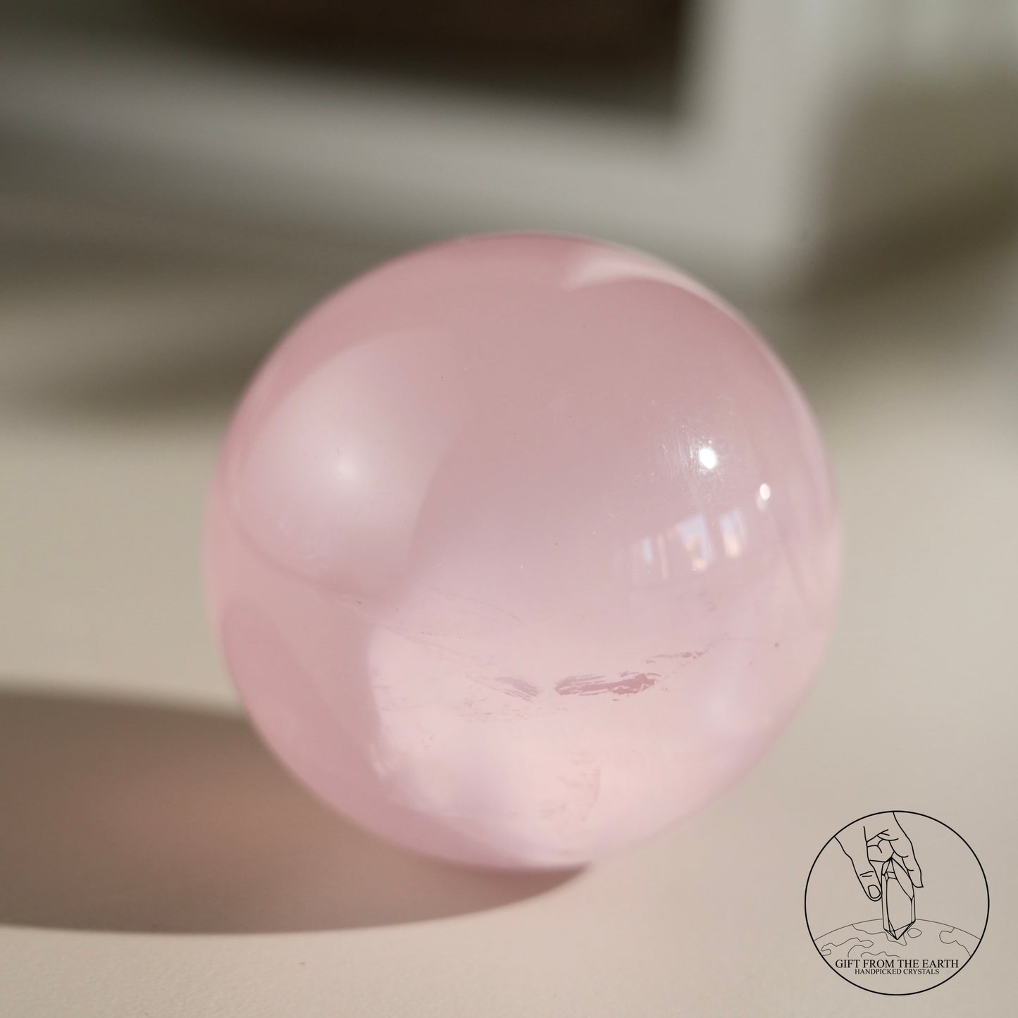 Mozambique starry rose quartz sphere