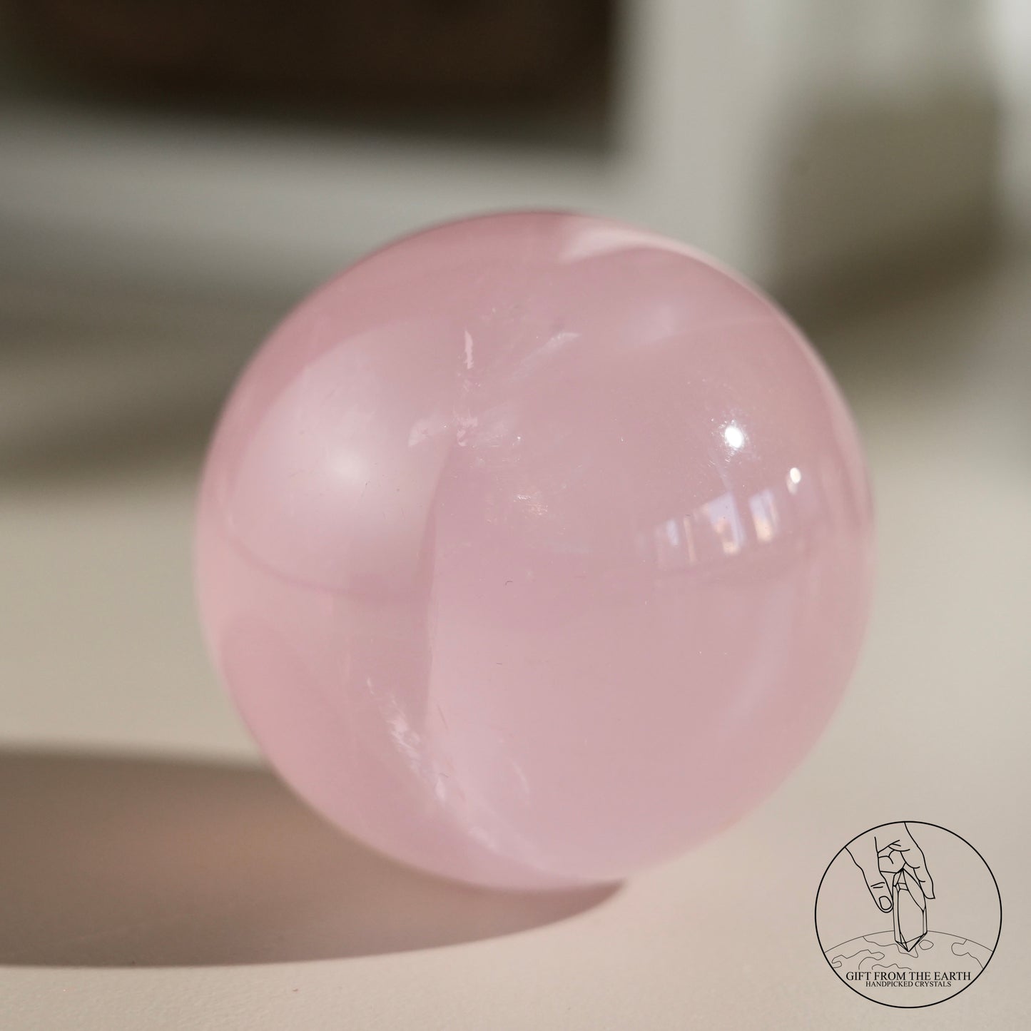 Mozambique starry rose quartz sphere