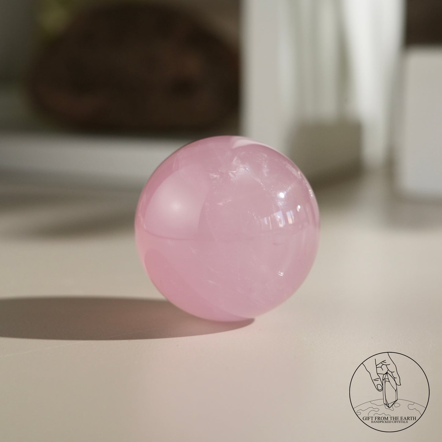 Mozambique starry rose quartz sphere