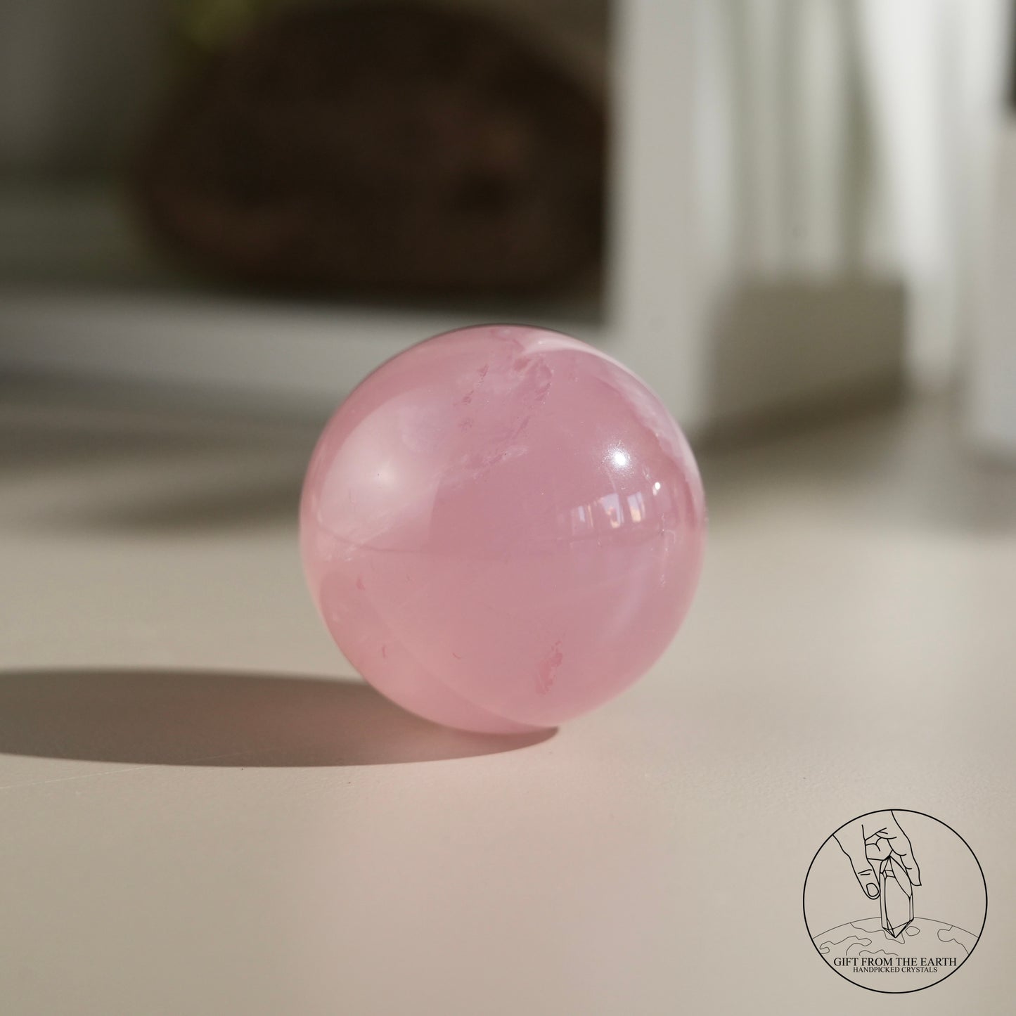 Mozambique starry rose quartz sphere