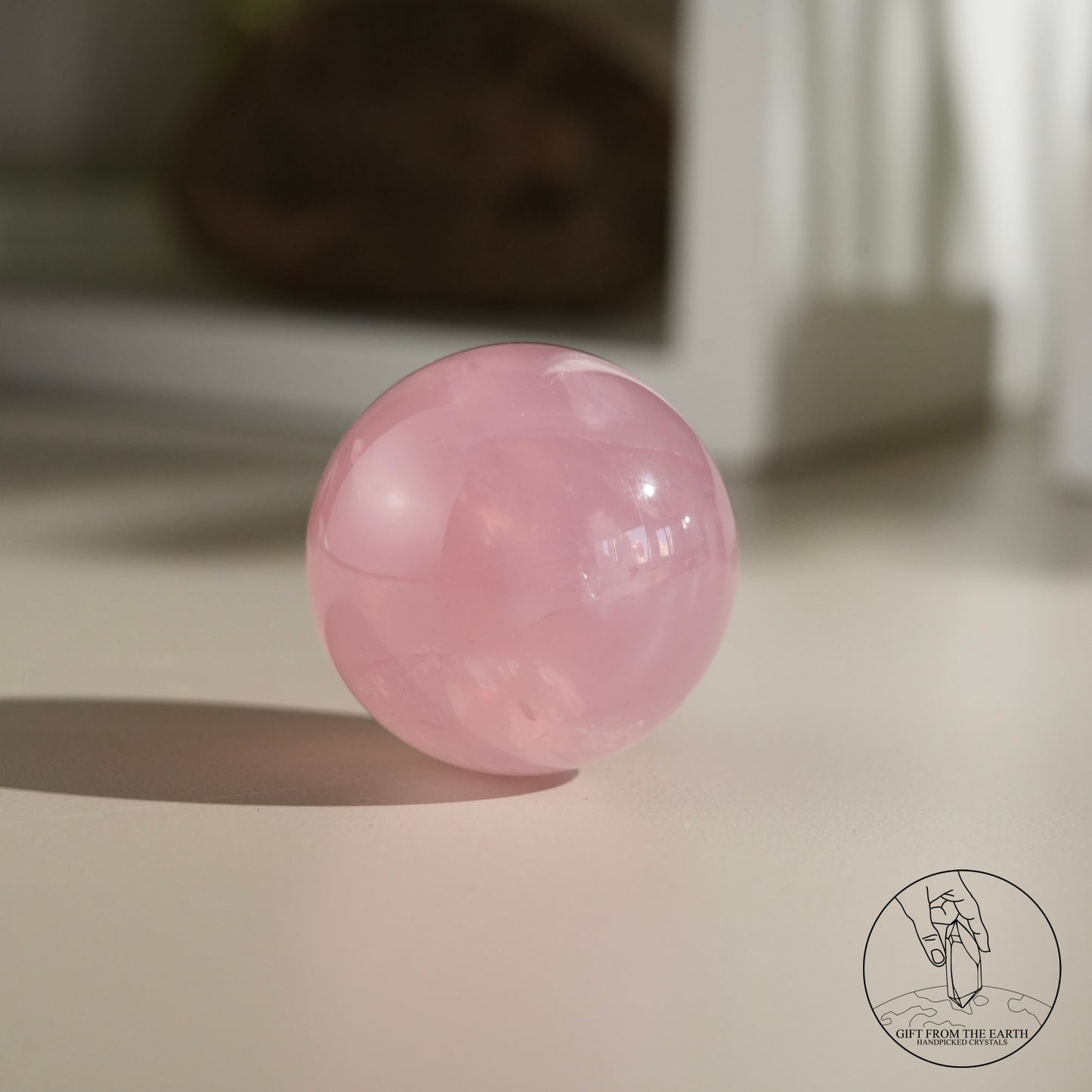 Mozambique starry rose quartz sphere