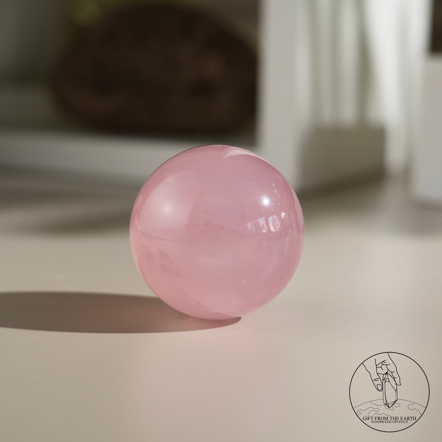 Mozambique starry rose quartz sphere