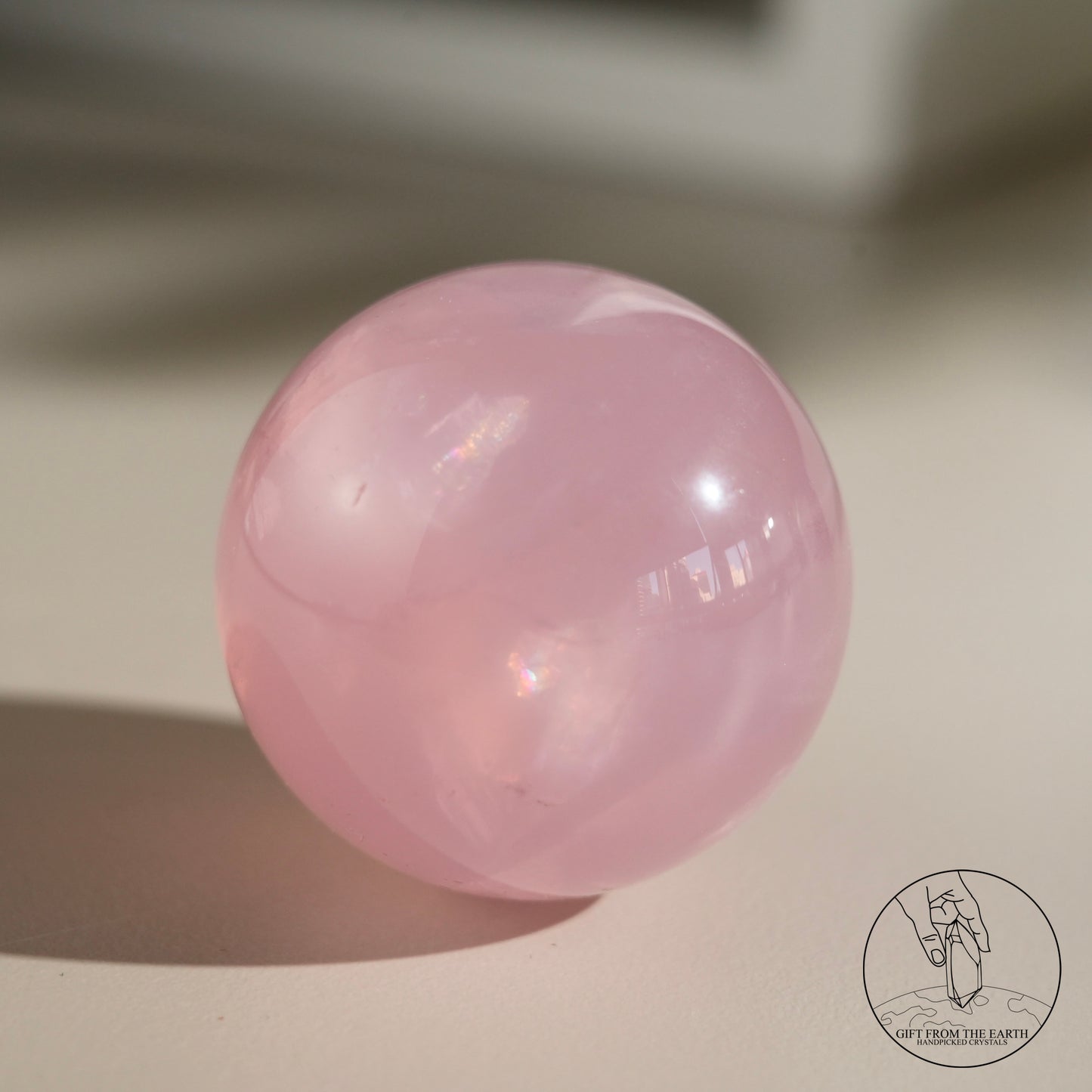 Mozambique starry rose quartz sphere