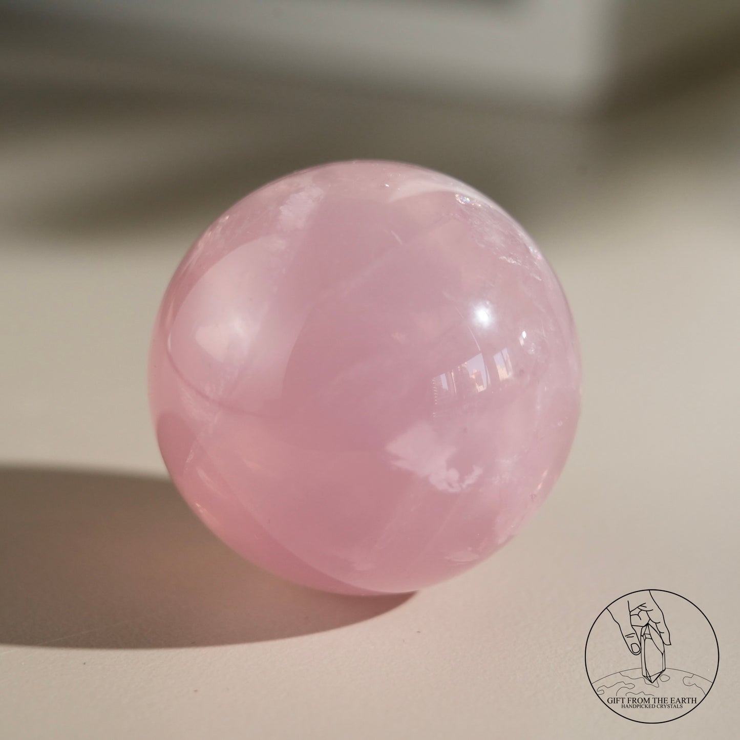 Mozambique starry rose quartz sphere